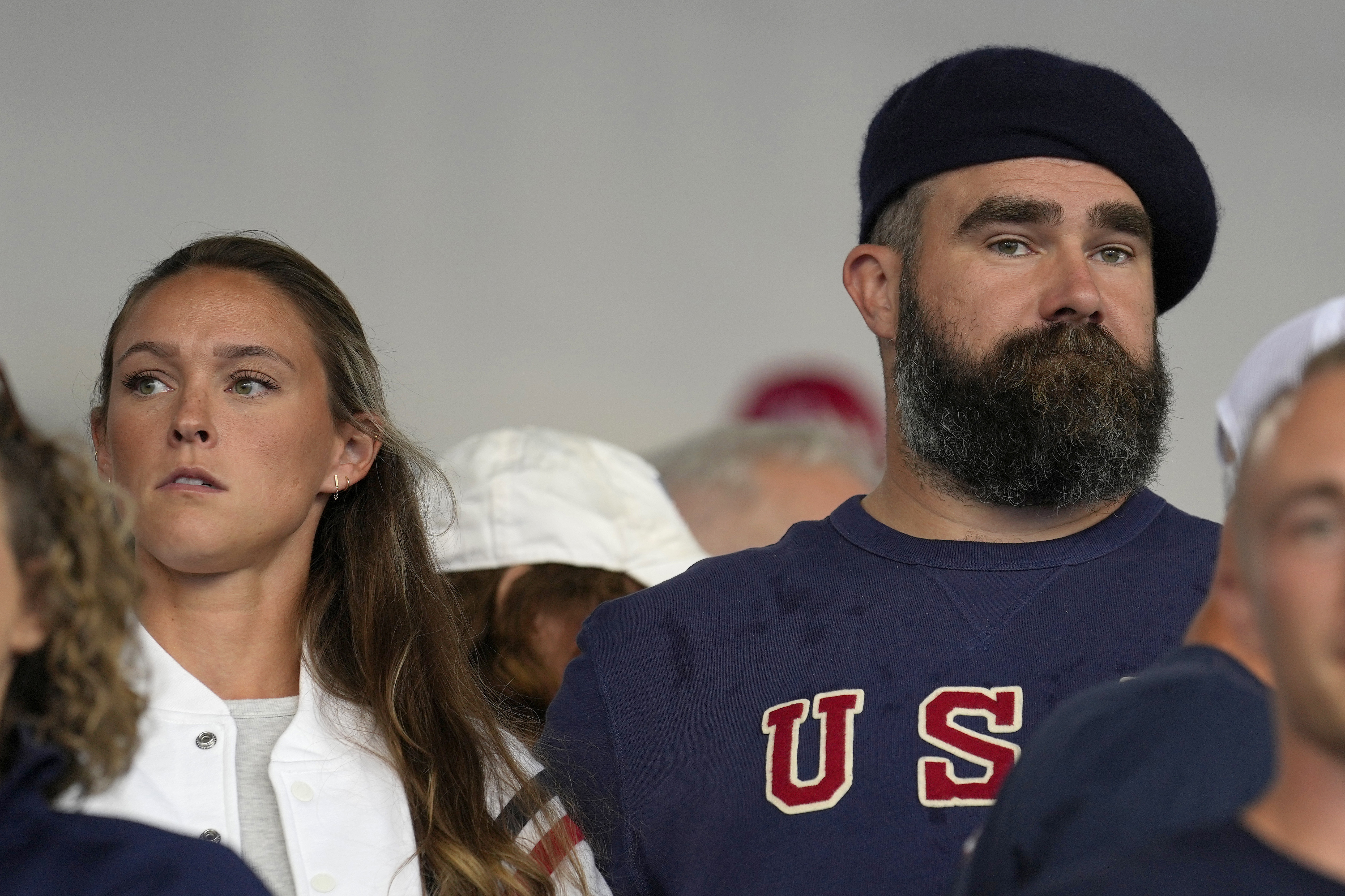 Recently retired Philadelphia Eagles lineman Jason Kelce and wife Kylie watch the women's field hockey match between the Argentina and United States, at the Yves-du-Manoir Stadium, at the 2024 Summer Olympics, Saturday, July 27, 2024, in Colombes, France. 