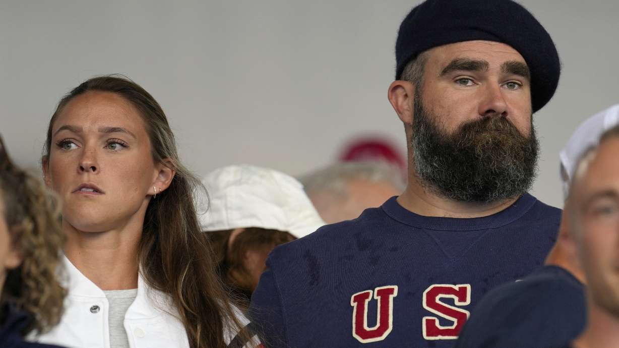 Recently retired Philadelphia Eagles lineman Jason Kelce and wife Kylie watch the women's field hockey match between the Argentina and United States, at the Yves-du-Manoir Stadium, at the 2024 Summer Olympics, Saturday, July 27, 2024, in Colombes, France.