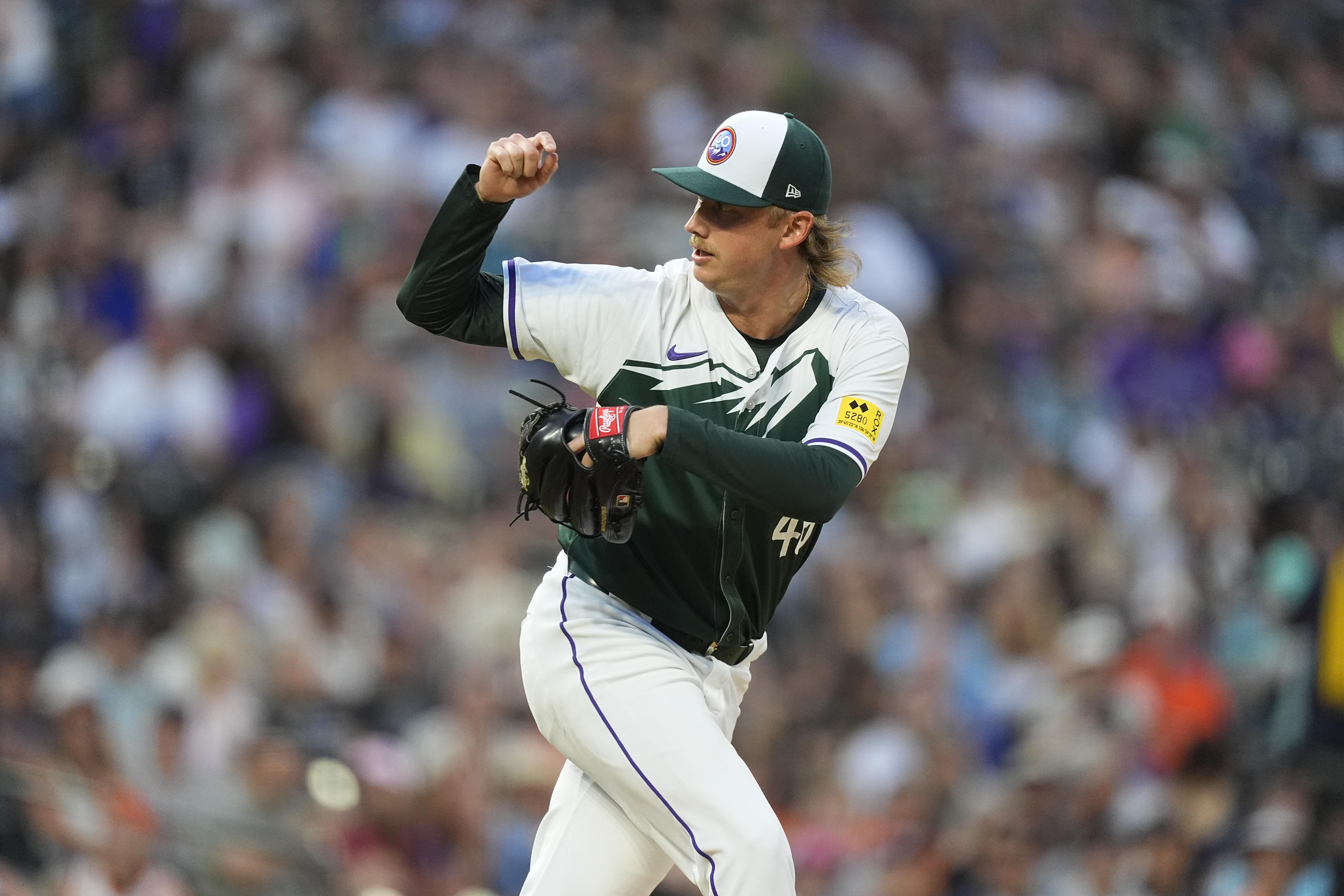 Colorado Rockies relief pitcher Nick Mears works against the San Francisco Giants in the seventh inning of a baseball game Saturday, July 20, 2024, in Denver. 