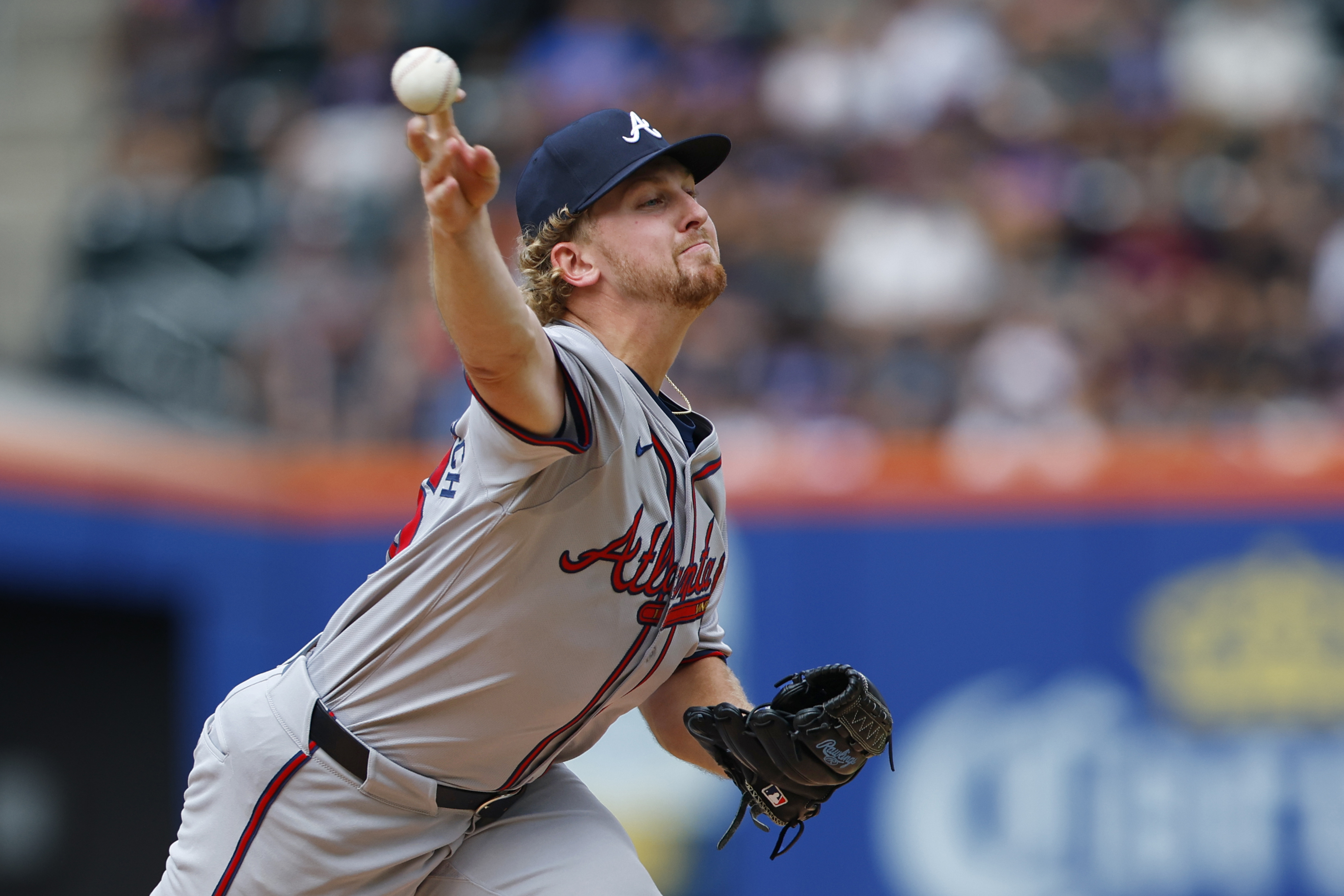 Atlanta Braves pitcher Spencer Schwellenbach (56) delivers a pitch against the New York Mets during the third inning of a baseball game, Saturday, July 27, 2024, in New York. 