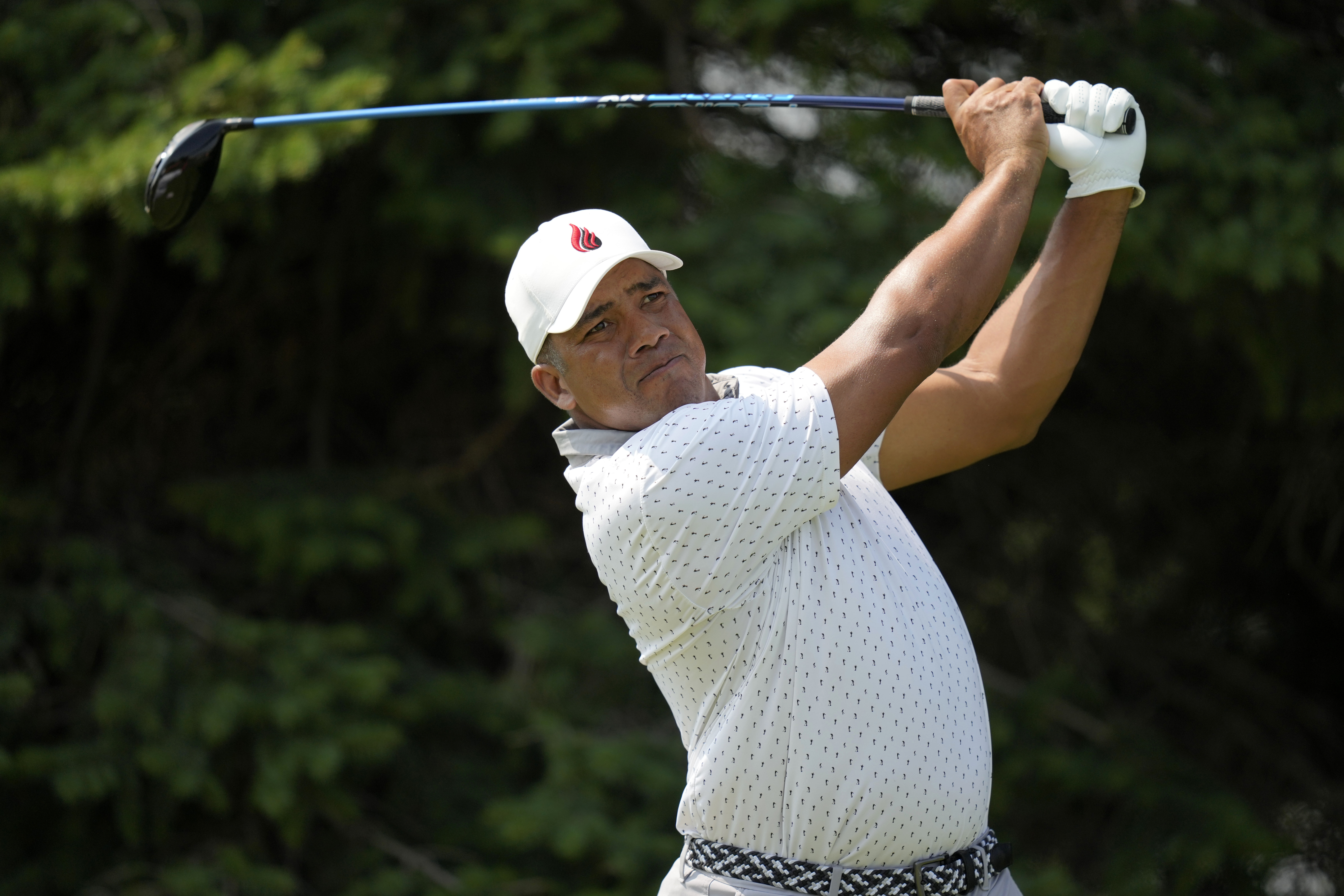 Jhonattan Vegas watches his tee shot on the second hole during the third round of the 3M Open golf tournament at the Tournament Players Club, Saturday, July 27, 2024, in Blaine, Minn. 