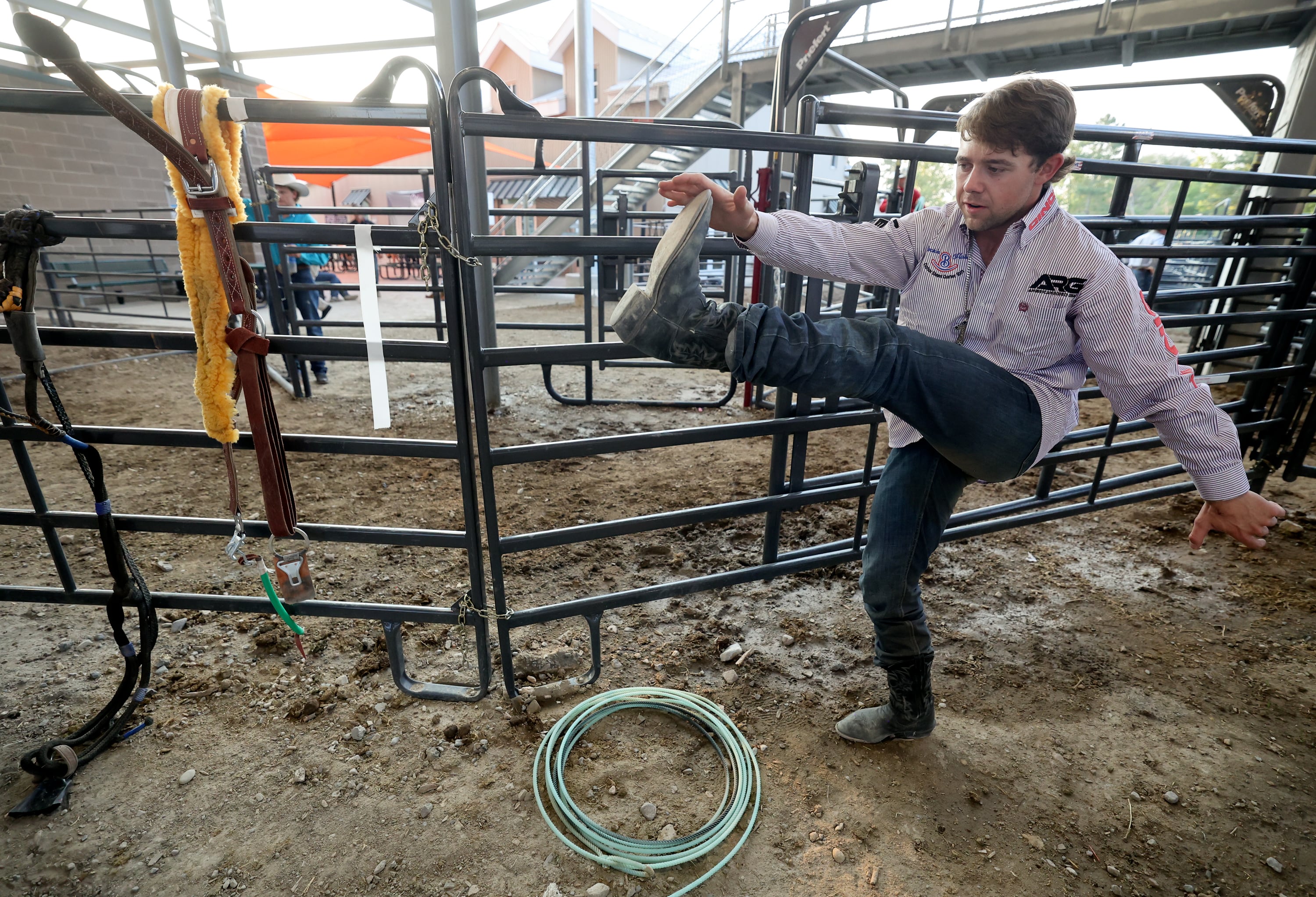 Hayes Weight, from Goshen, Utah County, warms up before competing in bull riding at the Days of ’47 Rodeo at the Utah State Fairpark in Salt Lake City on Monday. Weight scored 91 points on Sankey Rodeo’s Magic Touch, giving him the high score for the night and advancing him to the gold medal round.