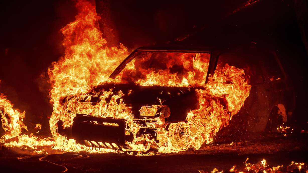 Flames consume a vehicle as the Park Fire burns in Tehama County, Calif., on Friday. Blockbuster fires, like what are burning now, are harder for the landscape to bounce back from than smaller ones.