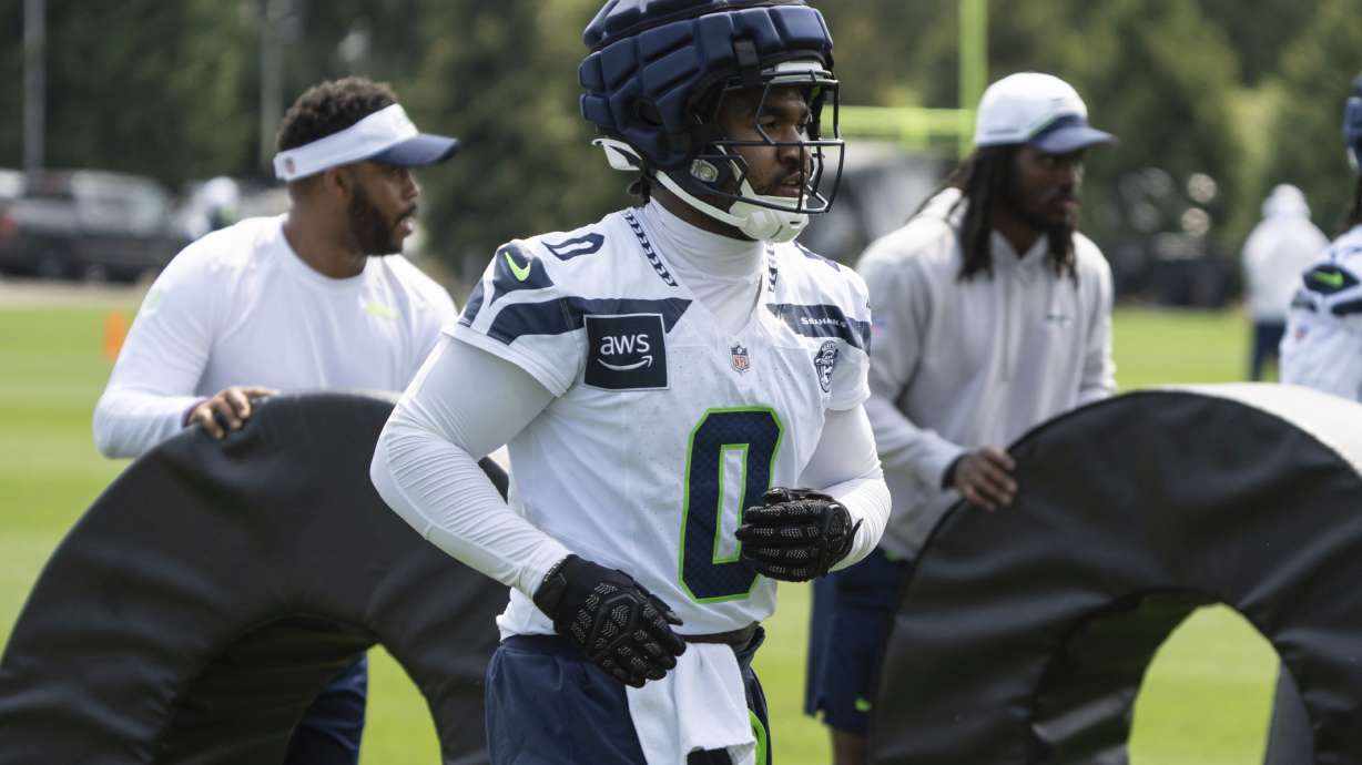 Seattle Seahawks linebacker Tyrel Dodson takes part in drill at NFL football training camp,, Saturday, July 27, 2024, in Renton, Wash.