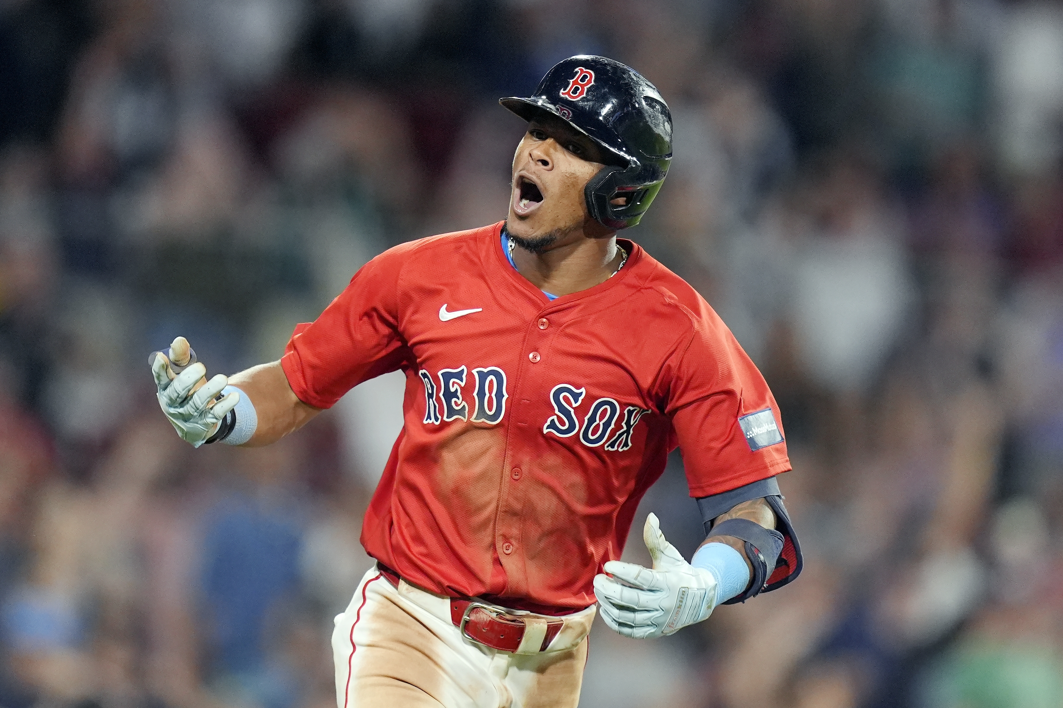 Boston Red Sox's Ceddanne Rafaela reacts after hitting a two-run home run during the seventh inning of a baseball game against the New York Yankees, Friday, July 26, 2024, in Boston. 