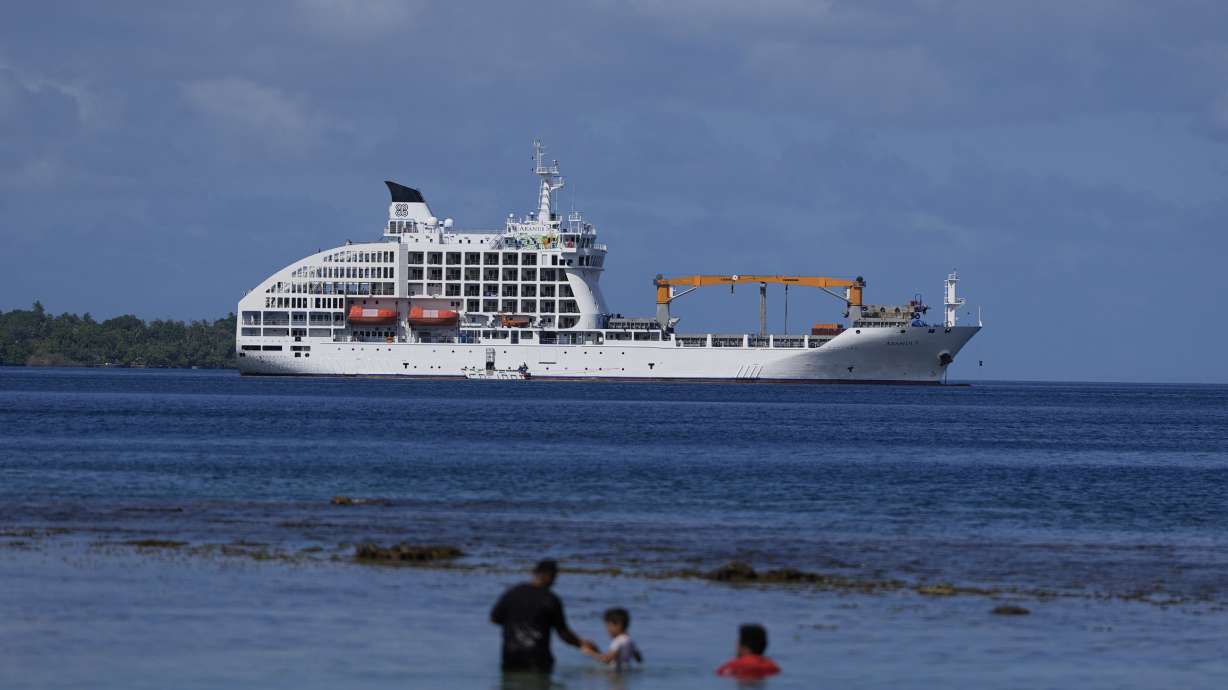 The Aranui 5 cruise ship sits off the coast ahead of the 2024 Summer Olympics surfing competition Friday, July 26, 2024, near Teahupo'o, Tahiti. The cruise ship is being used to house athletes competing in the surfing competition.
