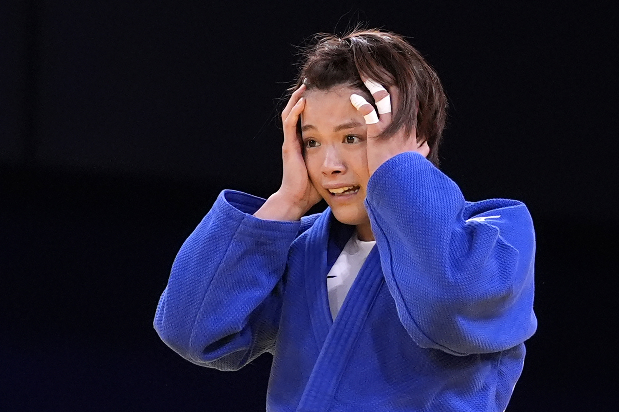 Japan's Uta Abe reacts after the women -52 kg elimination round match against Uzbekistan's Diyora Keldiyorova in team judo competition at Champ-de-Mars Arena during the 2024 Summer Olympics, Sunday, July 28, 2024, in Paris, France. 
