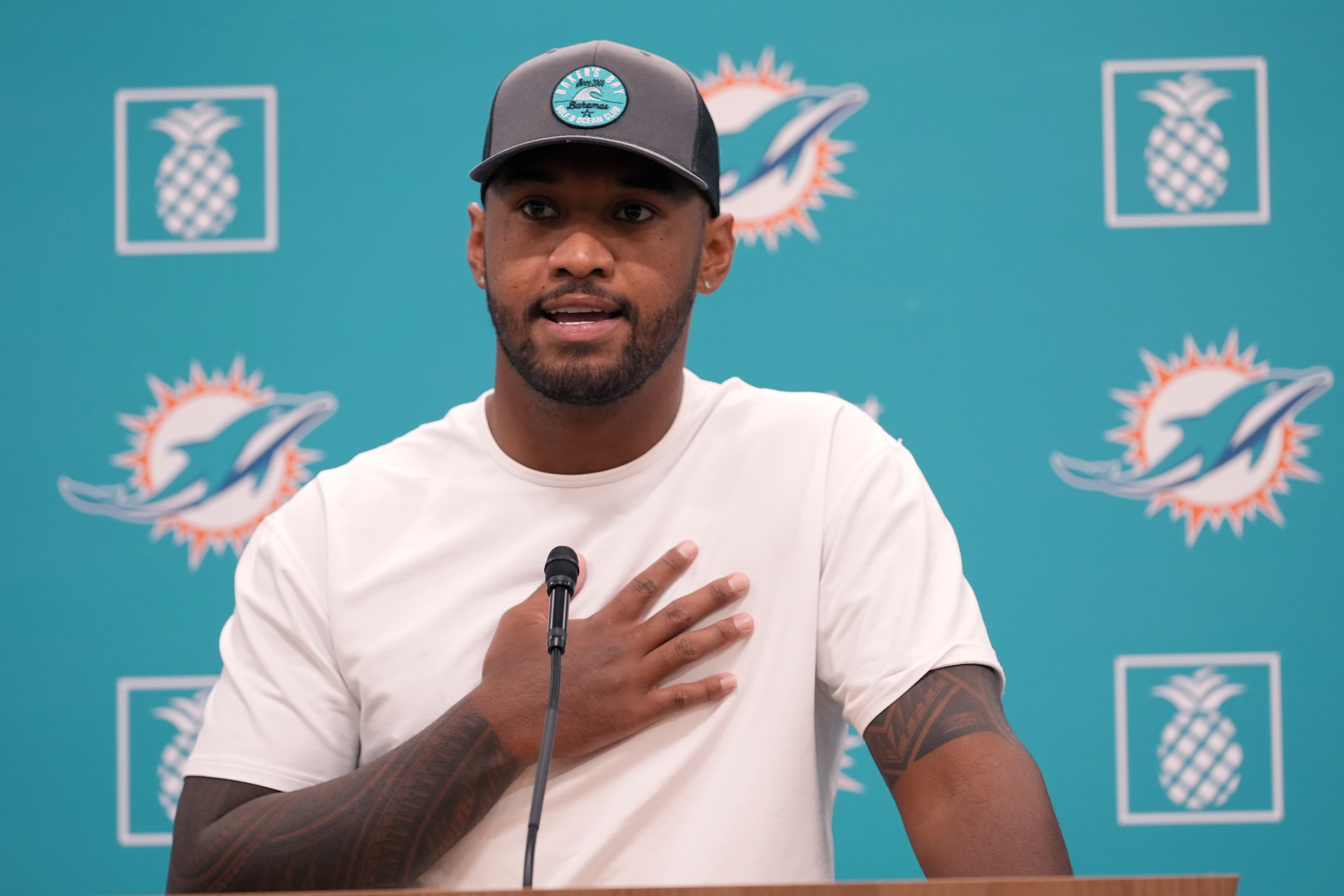 Miami Dolphins quarterback Tua Tagovailoa speaks during a news conference at the NFL football team's training camp Sunday, July 28, 2024, in Miami Gardens, Fla. 