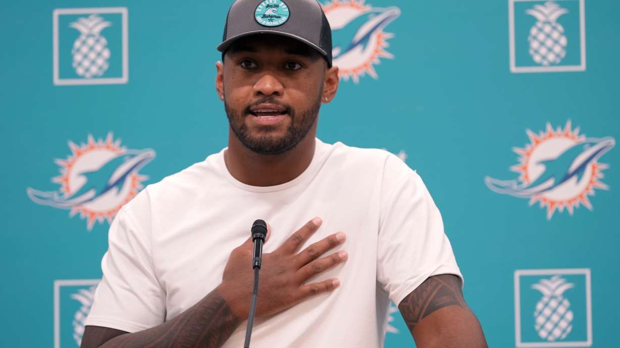 Miami Dolphins quarterback Tua Tagovailoa speaks during a news conference at the NFL football team's training camp Sunday, July 28, 2024, in Miami Gardens, Fla.