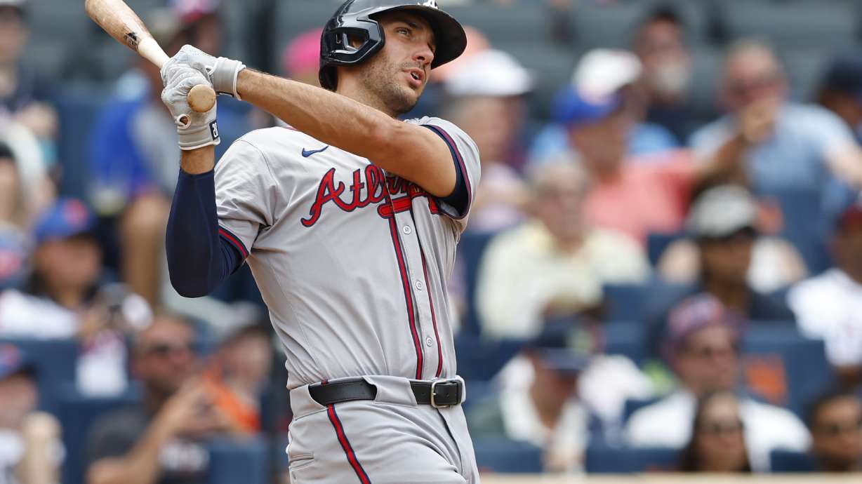 Atlanta Braves' Matt Olson hits a three-run home run against the New York Mets during the fourth inning of a baseball game, Sunday, July 28, 2024, in New York.