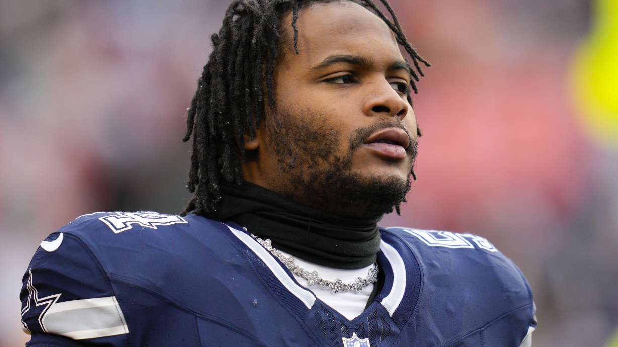FILE - Dallas Cowboys defensive end Sam Williams looks on during warmups before an NFL football game against the Washington Commanders, Jan. 7, 2024, in Landover, Md. Williams suffered torn ligaments in his left knee while taking part in special teams drills Sunday, July 28, 2024, and will need season-ending surgery.