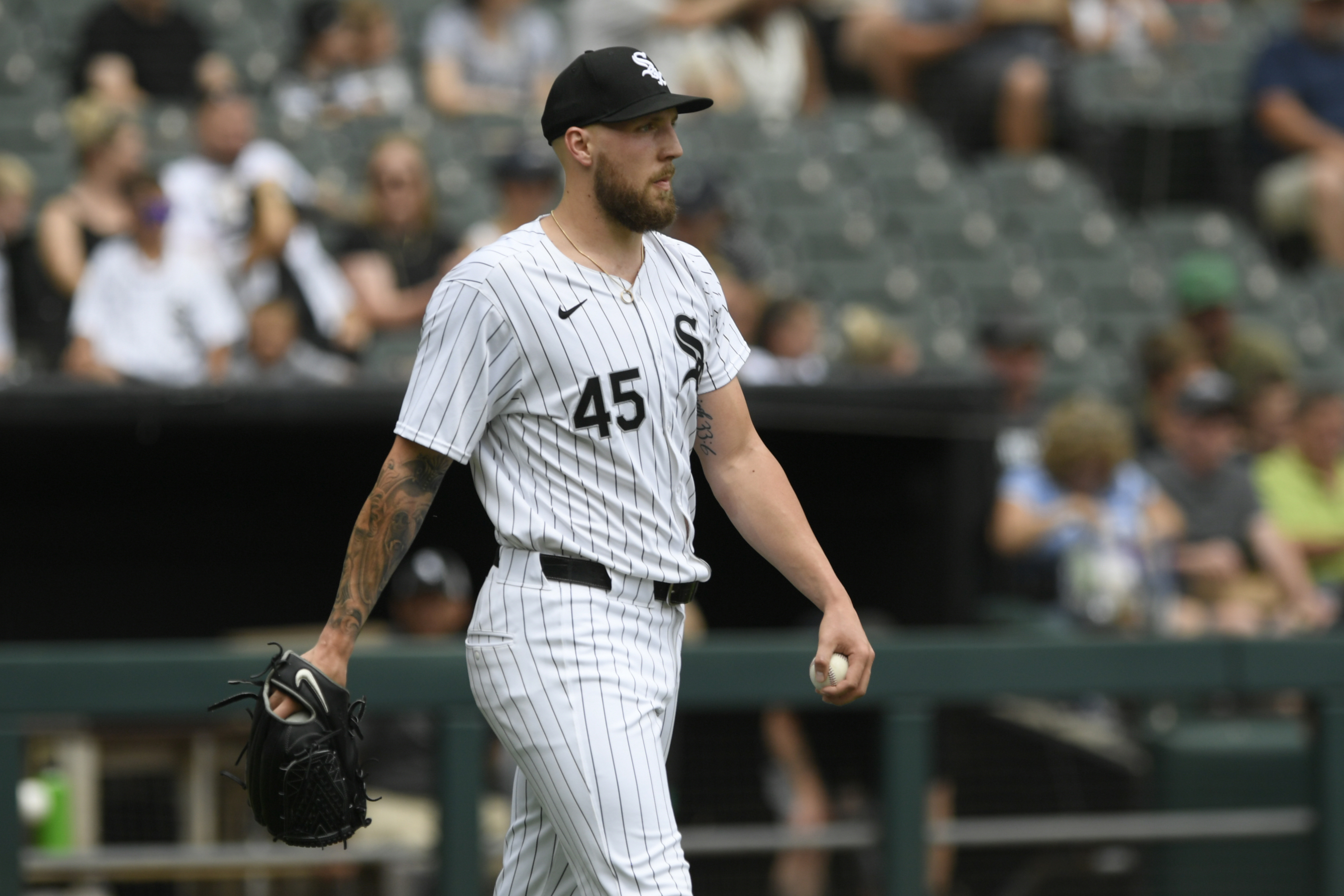 Chicago White Sox starting pitcher Garrett Crochet reacts after giving up a two-run home run to Seattle Mariners' Cal Raleigh during the first inning of a baseball game in Chicago, Sunday, July 28, 2024.