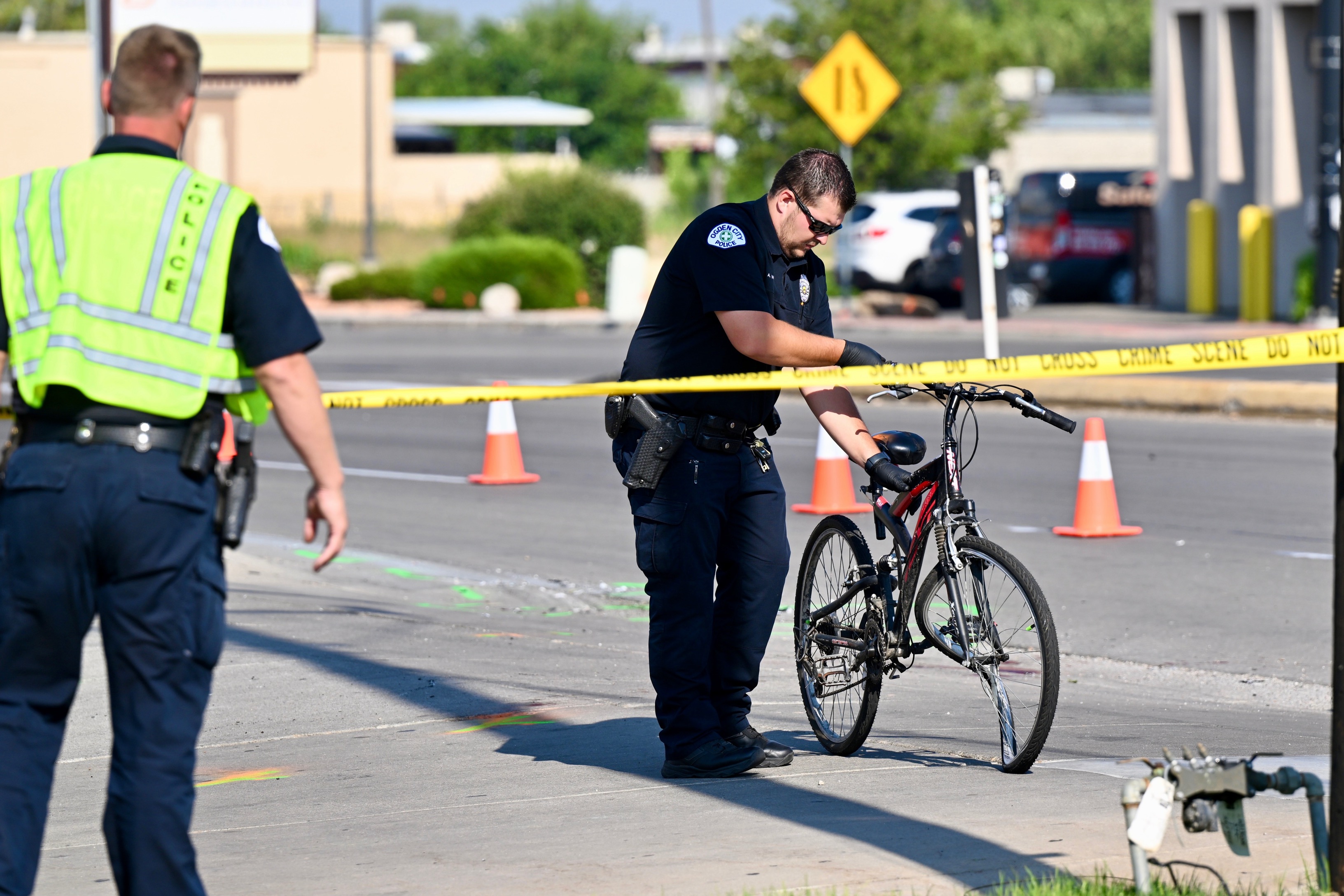 A cyclist died after being hit by a disposal truck in Ogden on Monday.