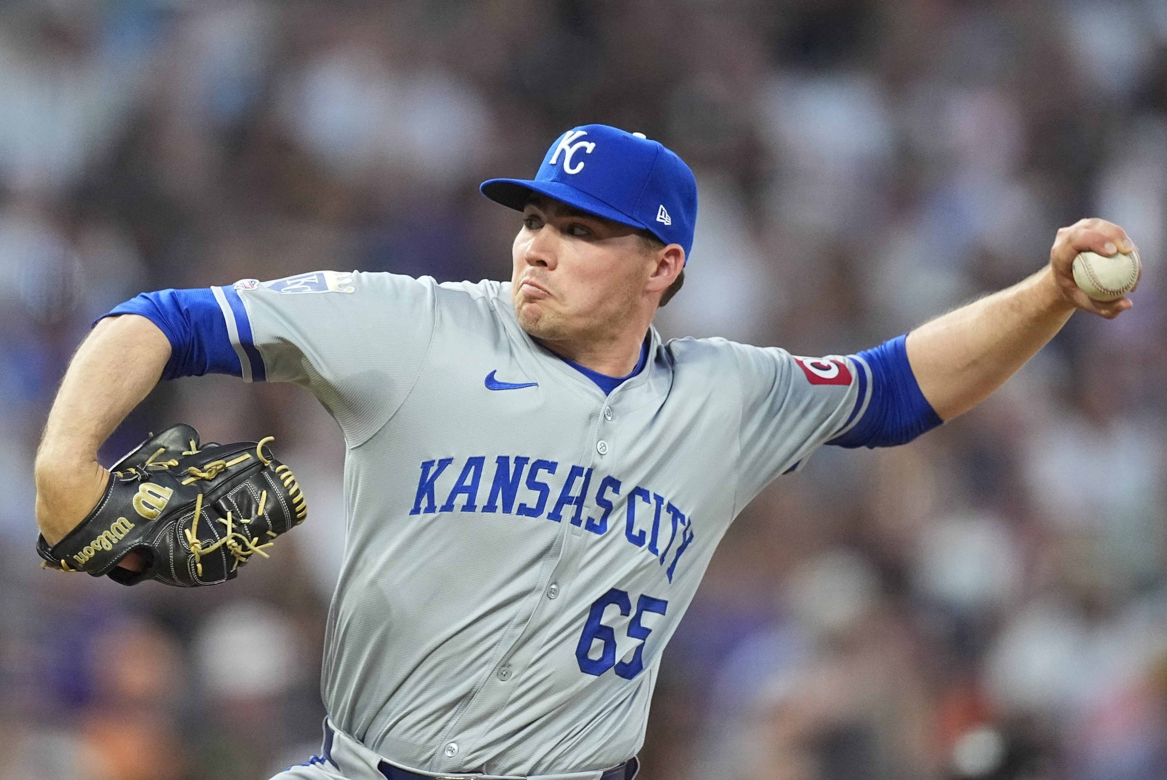 Kansas City Royals relief pitcher Walter Pennington works against the Colorado Rockies in the eighth inning of a baseball game Friday, July 5, 2024, in Denver. 