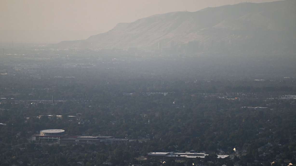 Smoke from wildfires creates haze in the Salt Lake Valley on Sunday. Wildfire smoke poses a greater risk to brain health than any other type of air pollution, according to findings of a decadeslong study released Monday.