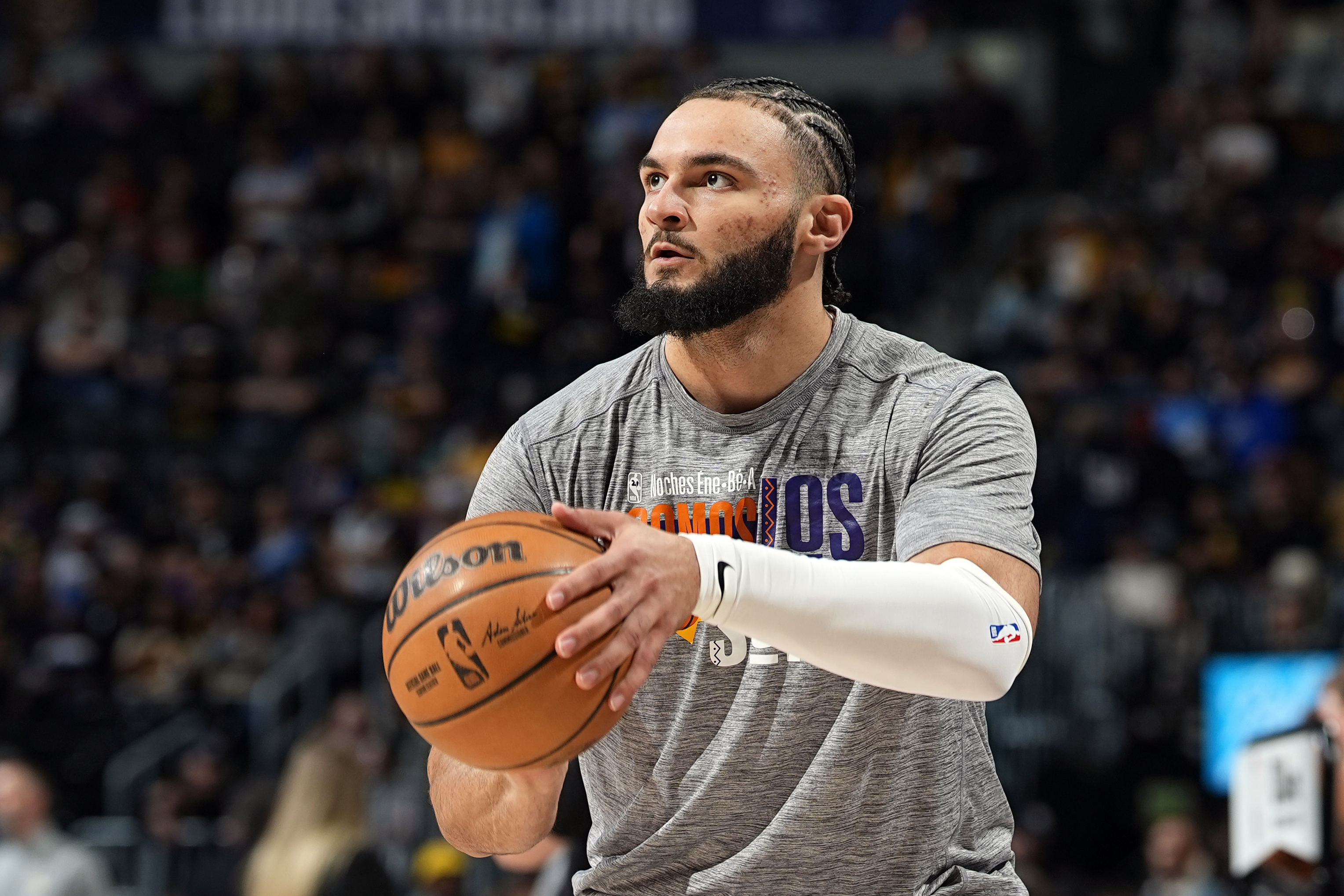 FILE - Phoenix Suns forward David Roddy (21) warms up before an NBA basketball game Tuesday, March 5, 2024, in Denver. The Atlanta Hawks acquired David Roddy from the Phoenix Suns in exchange for E.J. Liddell in a swap of power forwards on Monday, July 29, 2024.