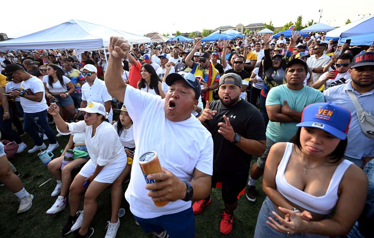 Venezuelans celebrate the election in their home country in Herriman on Sunday.