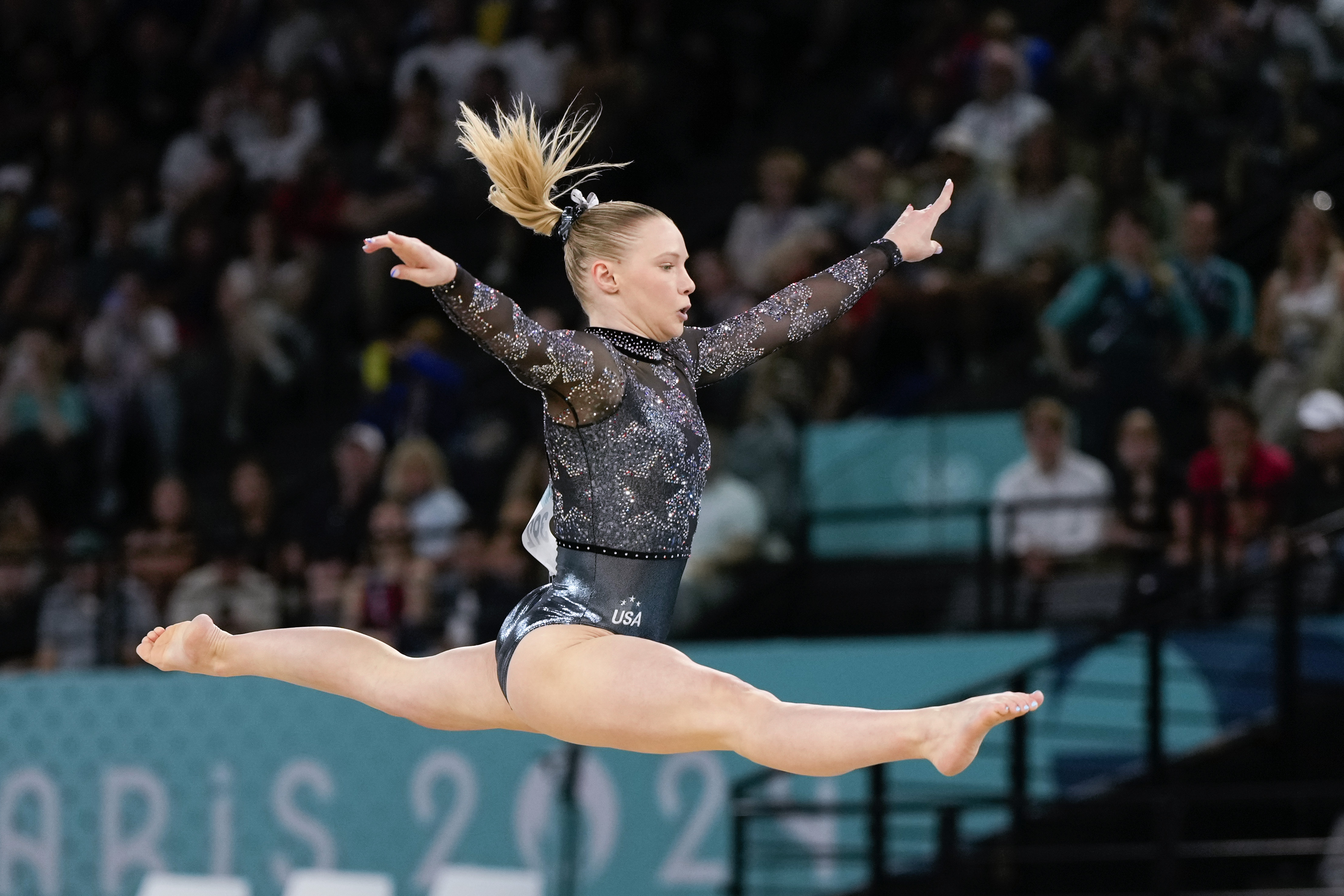 Jade Carey, of United States, competes on the floor exercise during a women's artistic gymnastics qualification round at the 2024 Summer Olympics, Sunday, July 28, 2024, in Paris, France. 