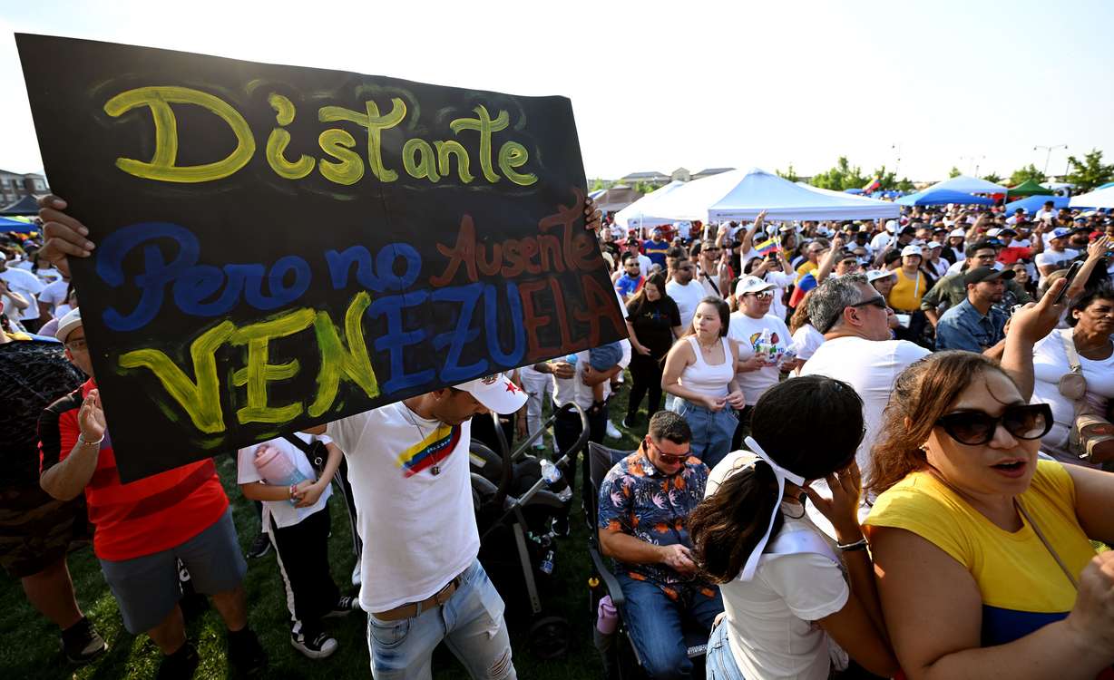 Venezuelans celebrate the election in their home country in Herriman on Sunday.