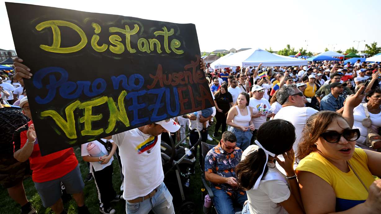 The Trump administration has decided to end protected status for nearly 350,000 Venezuelan immigrants in the United States. In the July 28, 2024, photo, Venezuelans in Herriman mark presidential elections in their home country.