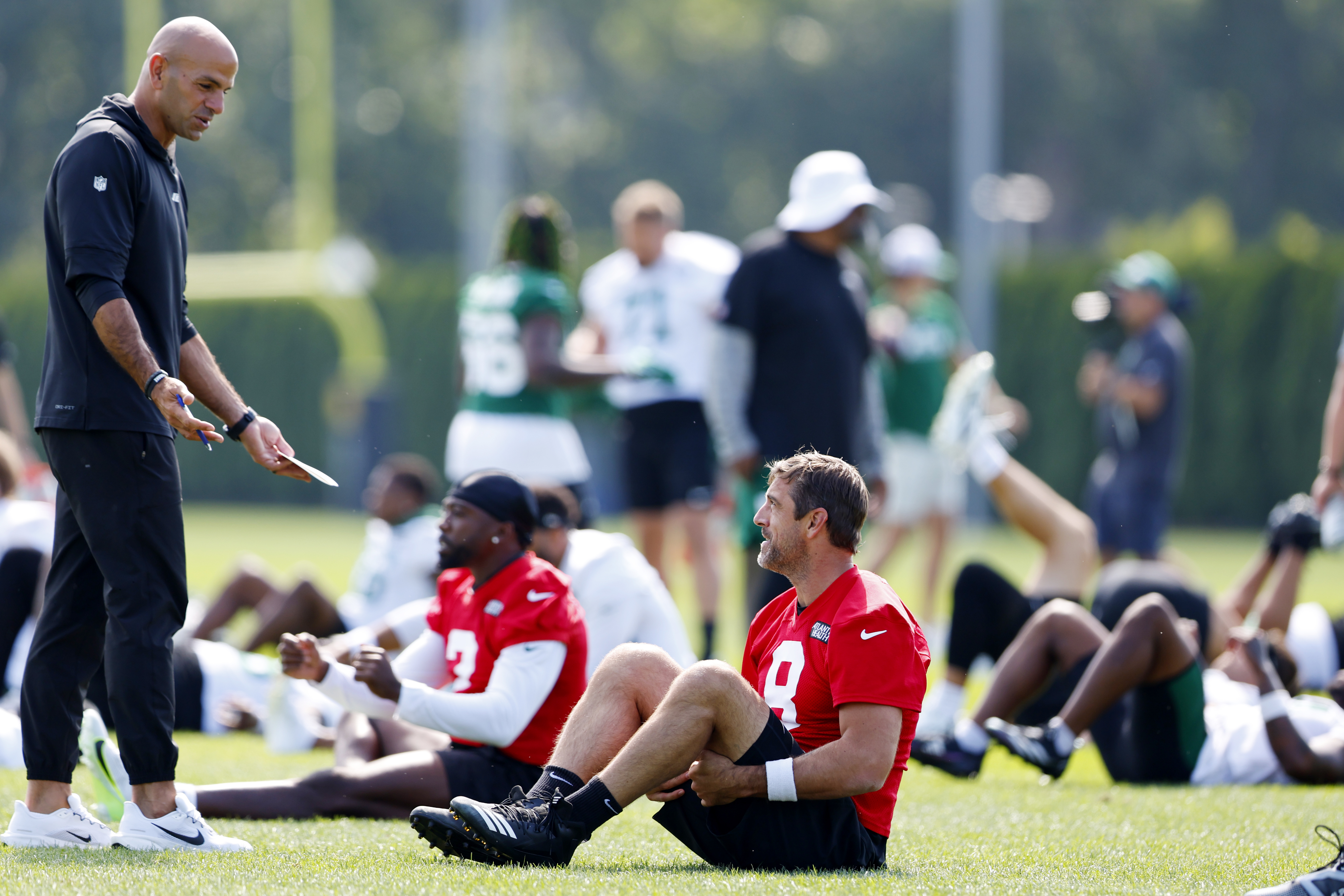 New York Jets head coach Robert Saleh talks with quarterback Aaron Rodgers (8) during the team's NFL football training camp, Saturday, July 27, 2024, in Florham Park, N.J. 