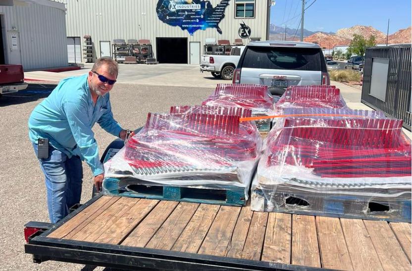 Stacy Stubbs, of Hilldale, inspects an order of 200 Sticker Burr Rollers in 2023.