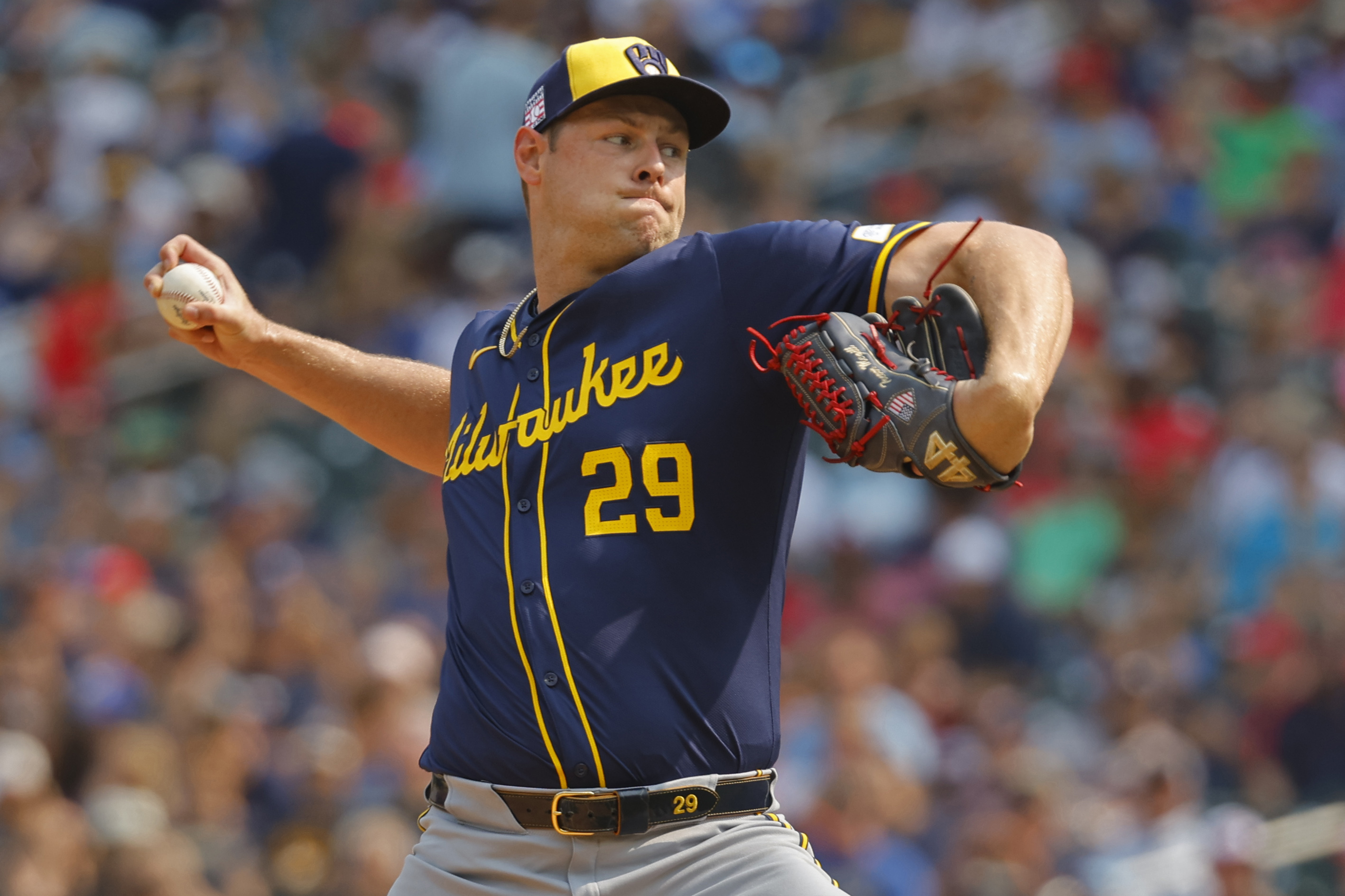 Milwaukee Brewers relief pitcher Trevor Megill throws to the Minnesota Twins in the ninth inning of a baseball game Sunday, July 21, 2024, in Minneapolis. 