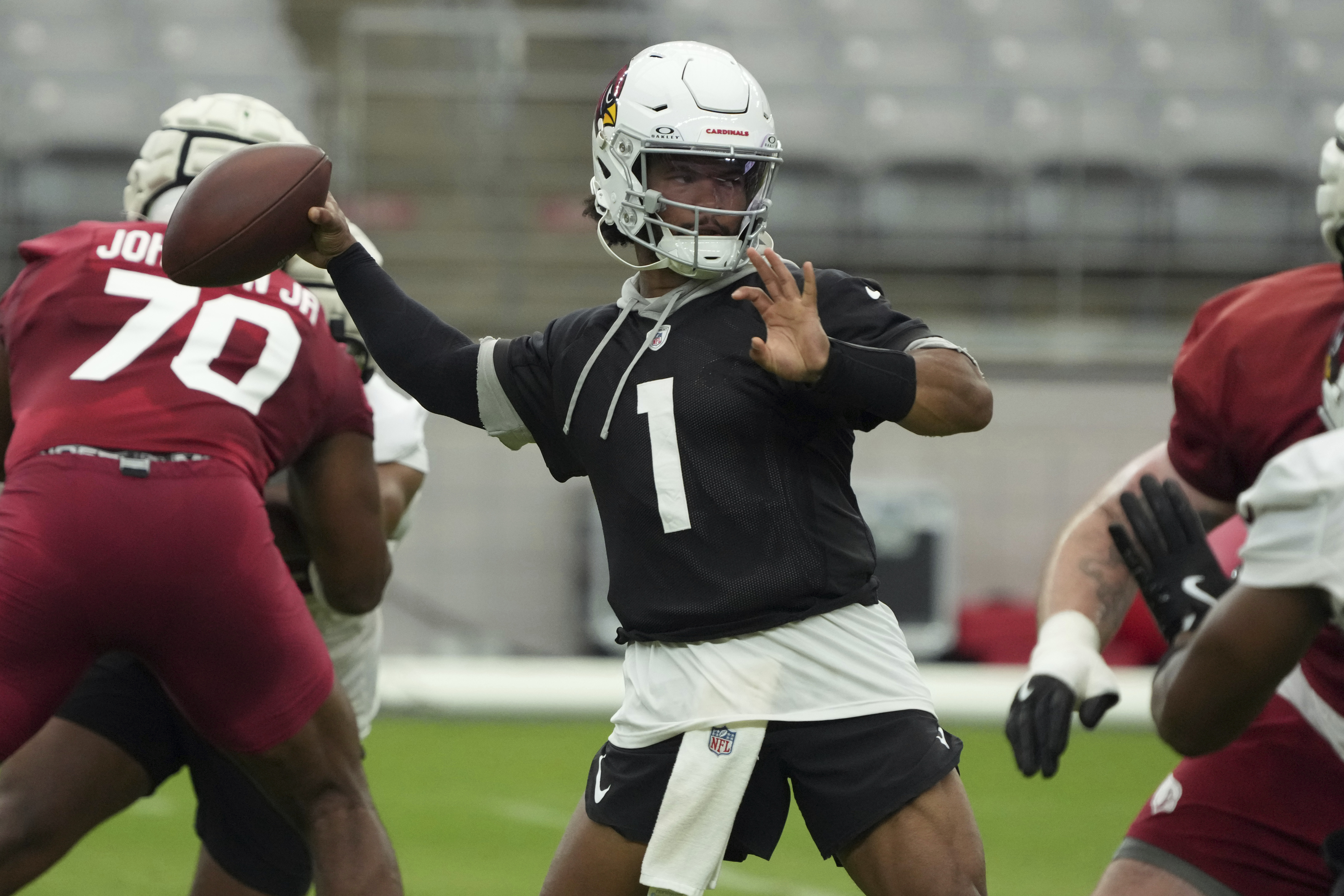 Arizona Cardinals quarterback Kyler Murray (1) throws a pass during NFL football training camp Sunday, July 28, 2024, in Glendale, Ariz.