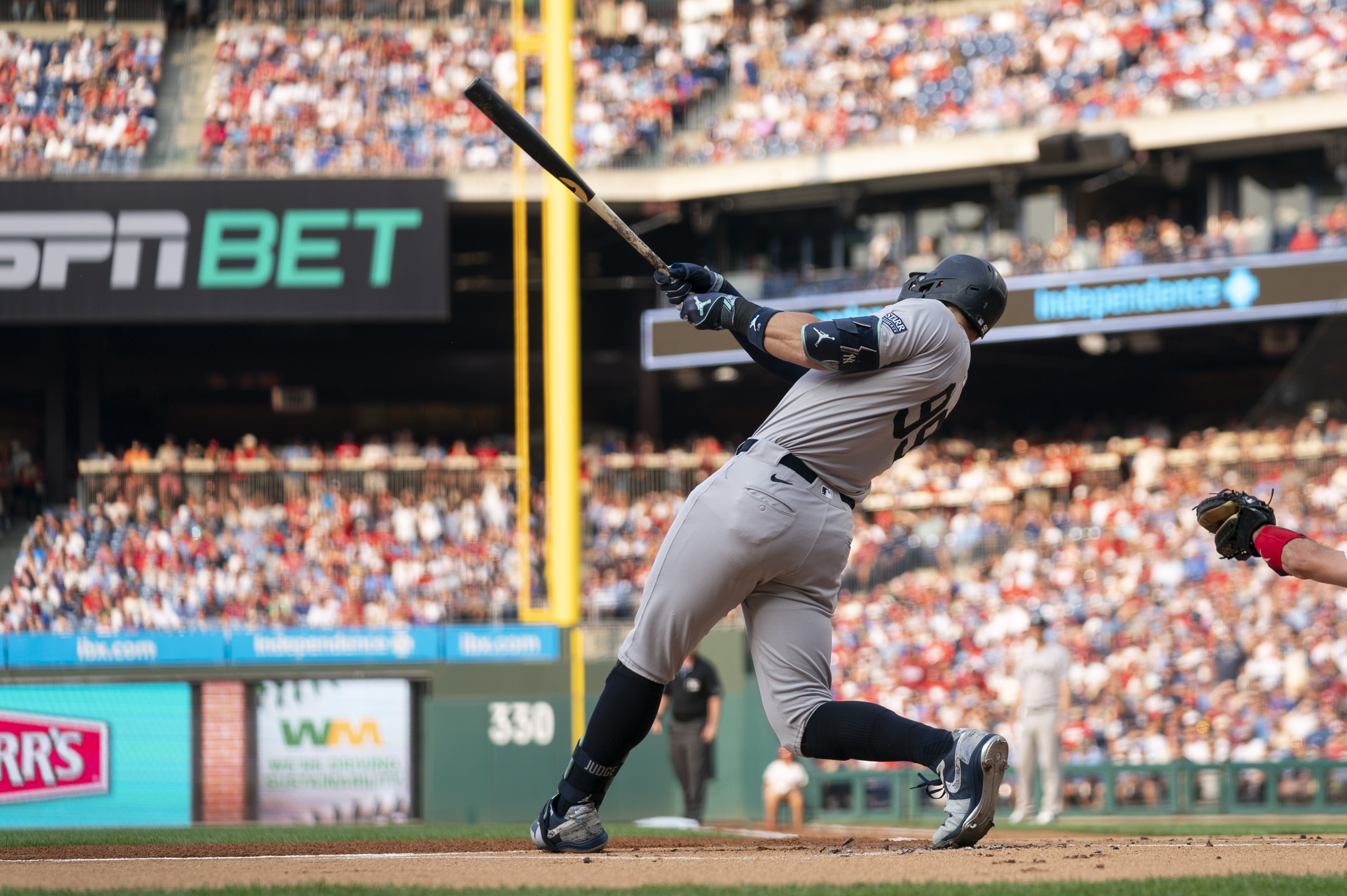 New York Yankees' Aaron Judge hits a solo home run during the first inning of a baseball game against the Philadelphia Phillies, Monday, July 29, 2024, in Philadelphia. 