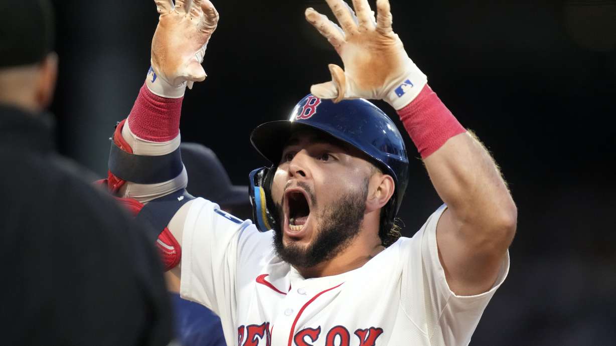 Boston Red Sox's Wilyer Abreu reacts after his RBI single during the third inning of a baseball game against the Seattle Mariners, Monday, July 29, 2024, in Boston.