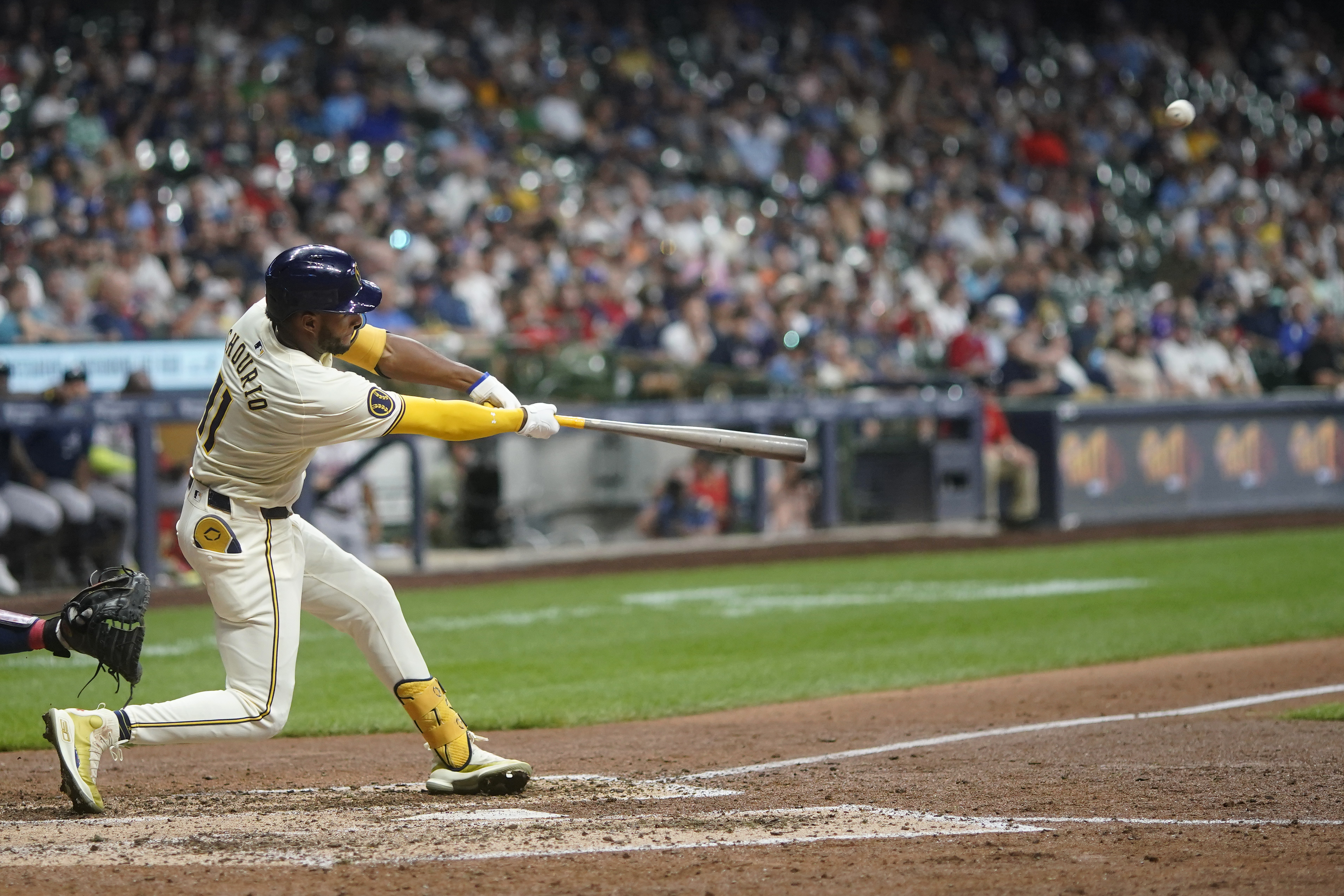 Milwaukee Brewers' Jackson Chourio hits a two-run home run during the eighth inning of a baseball game against the Atlanta Braves, Monday, July 29, 2024, in Milwaukee. 