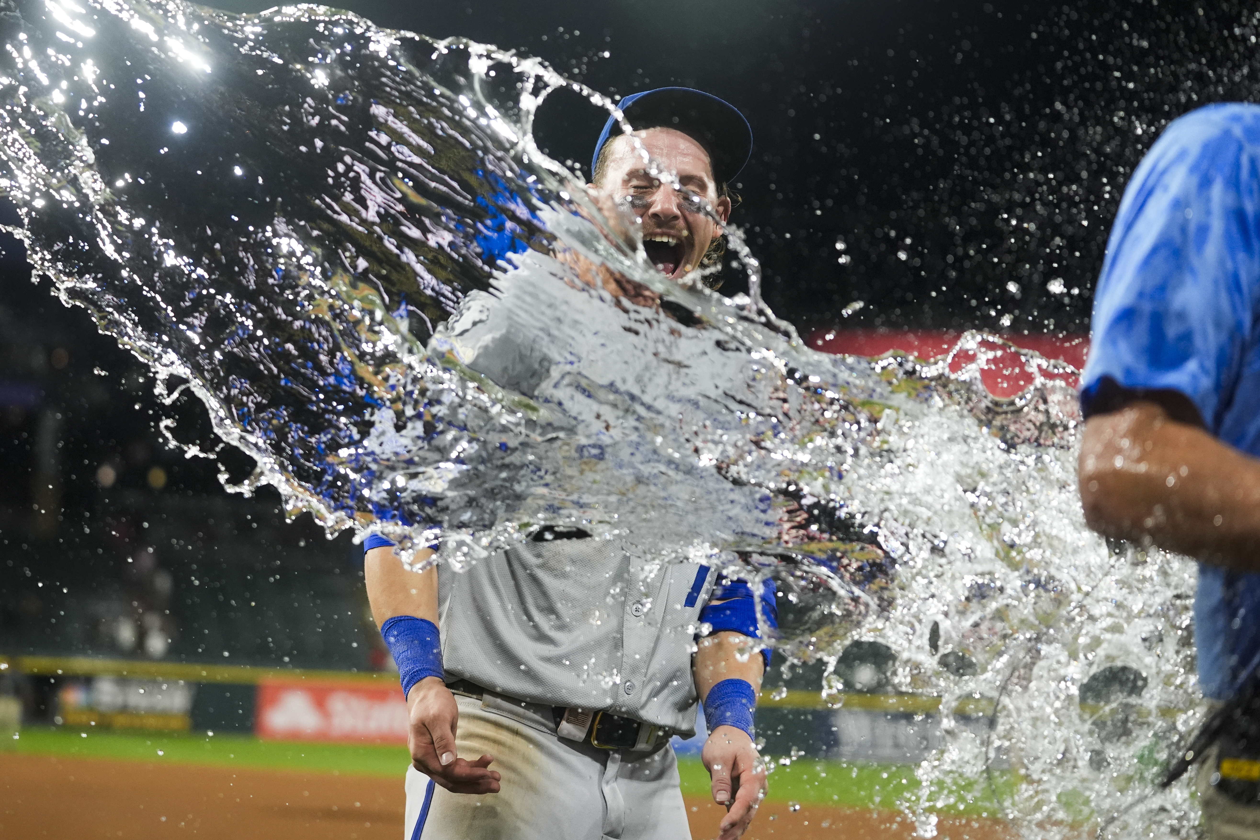 Kansas City Royals' Bobby Witt Jr. is doused as his team celebrates after their win over the Chicago White Sox in a baseball game Monday, July 29, 2024, in Chicago. 