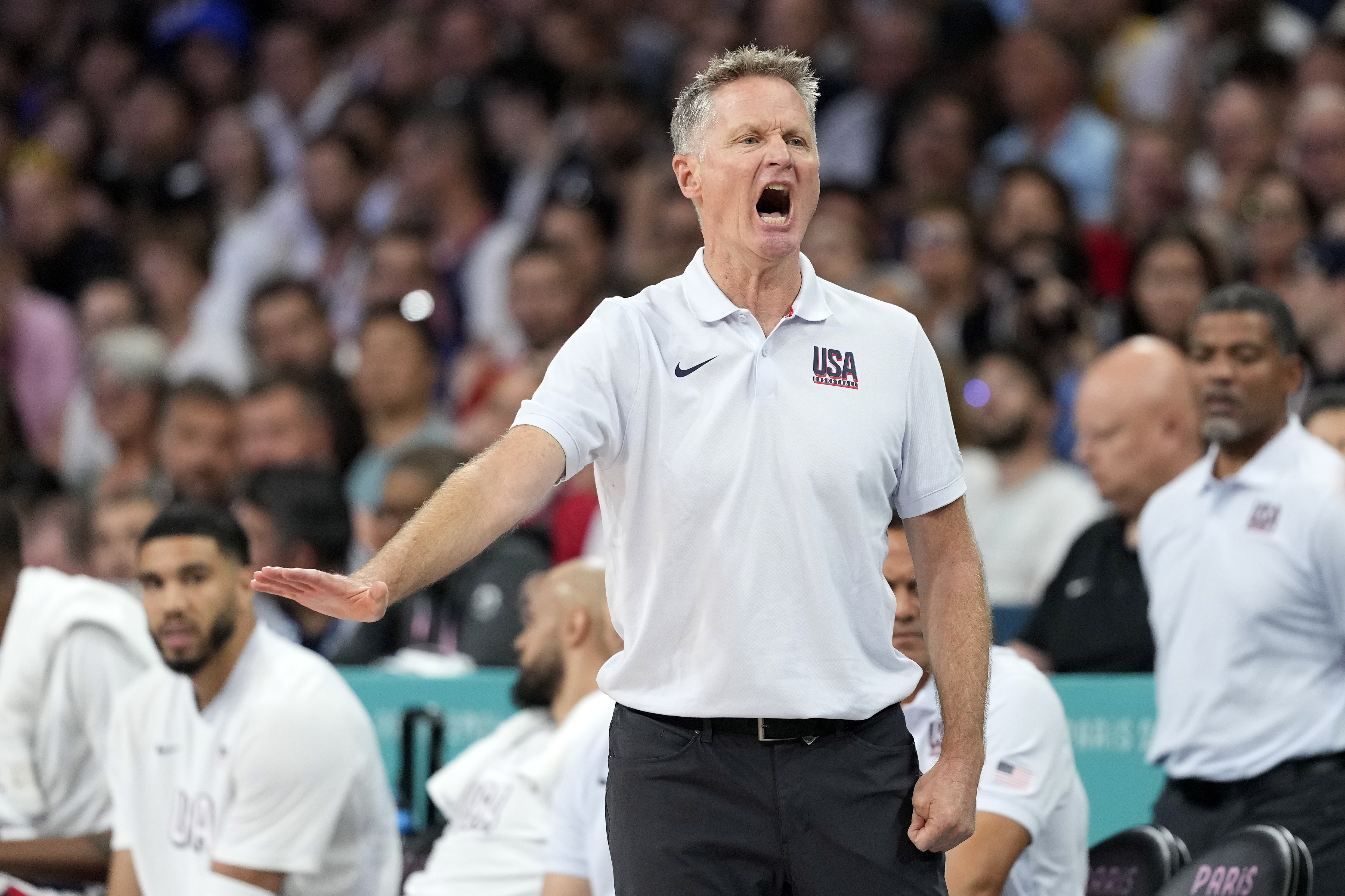 United States head coach Steve Kerr gestures in a men's basketball game against Serbia at the 2024 Summer Olympics, Sunday, July 28, 2024, in Villeneuve-d'Ascq, France. 