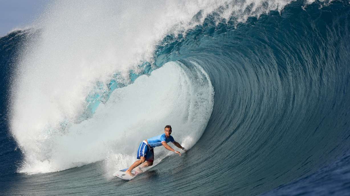 Kauli Vaast, of France, surfs during the third round of surfing competition at the 2024 Summer Olympics, Monday, July 29, 2024, in Teahupo'o, Tahiti.