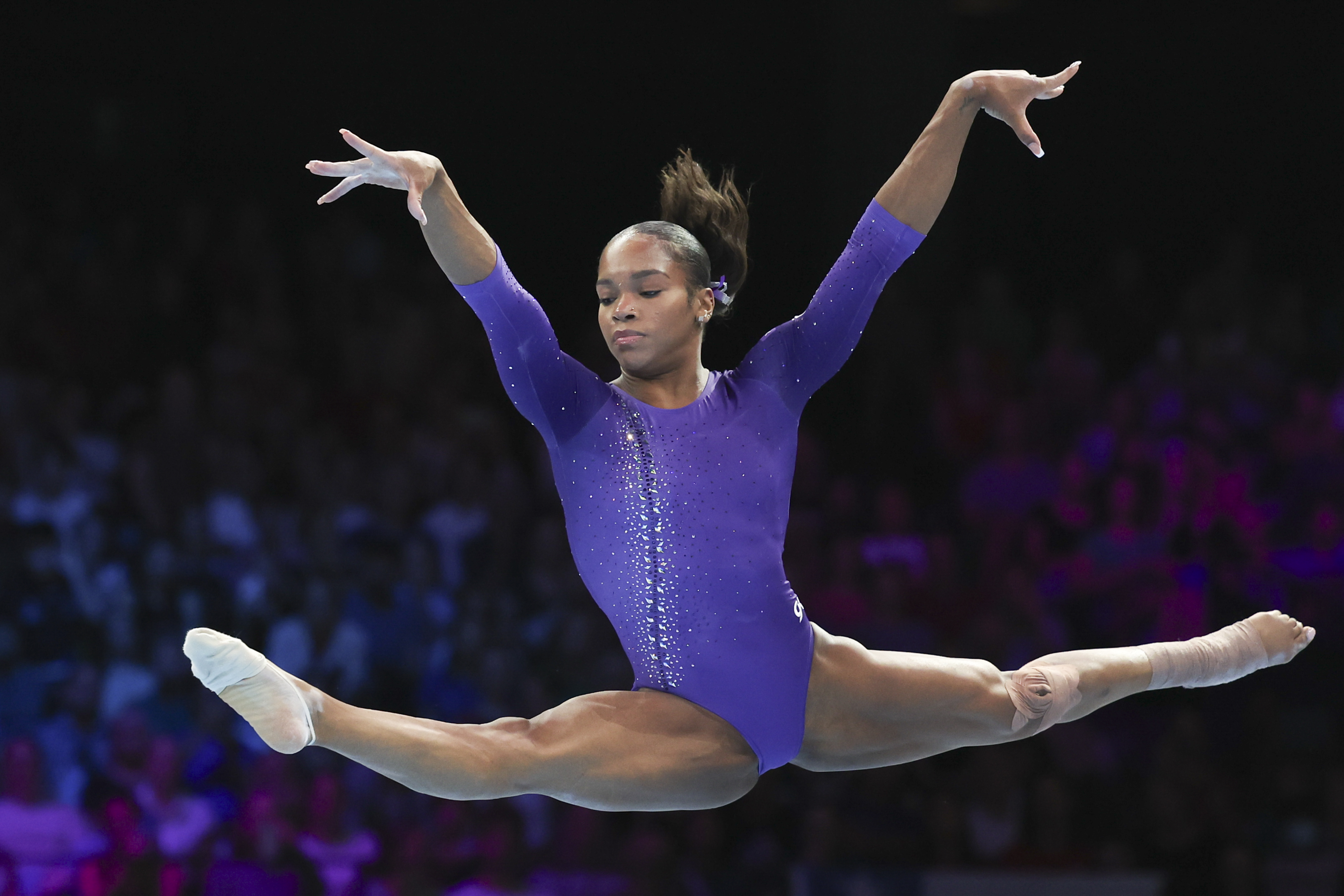 FILE - United States' Shilese Jones competes on the floor during the apparatus finals at the Artistic Gymnastics World Championships in Antwerp, Belgium, on Oct. 8, 2023. Jones announced on social media late Monday that she tore the ACL and meniscus in her left knee during the U.S. Olympic trials. The 22-year-old Jones says she plans to continue the sport with the goal of making the 2028 Games in Los Angeles.