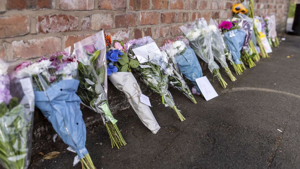 Floral tributes in Hart Street, Southport, Britain, Tuesday where three children have died and nine were injured in a "ferocious" knife attack during a Taylor Swift event at a dance school on Monday.