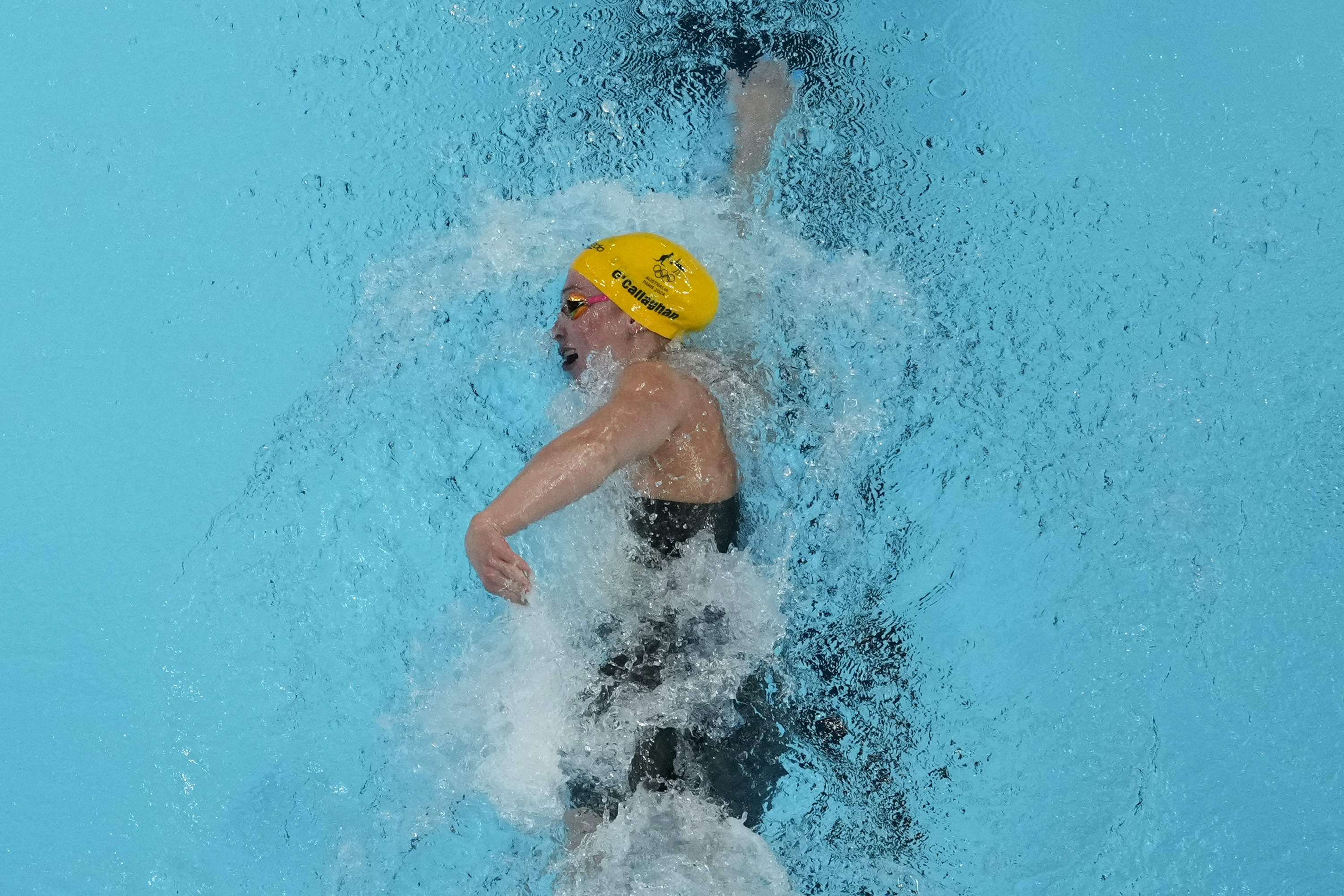 Mollie O'Callaghan of Australia, competes in the women's 200-meter freestyle final at the 2024 Summer Olympics, Monday, July 29, 2024, in Nanterre, France. O'Callaghan won gold. 