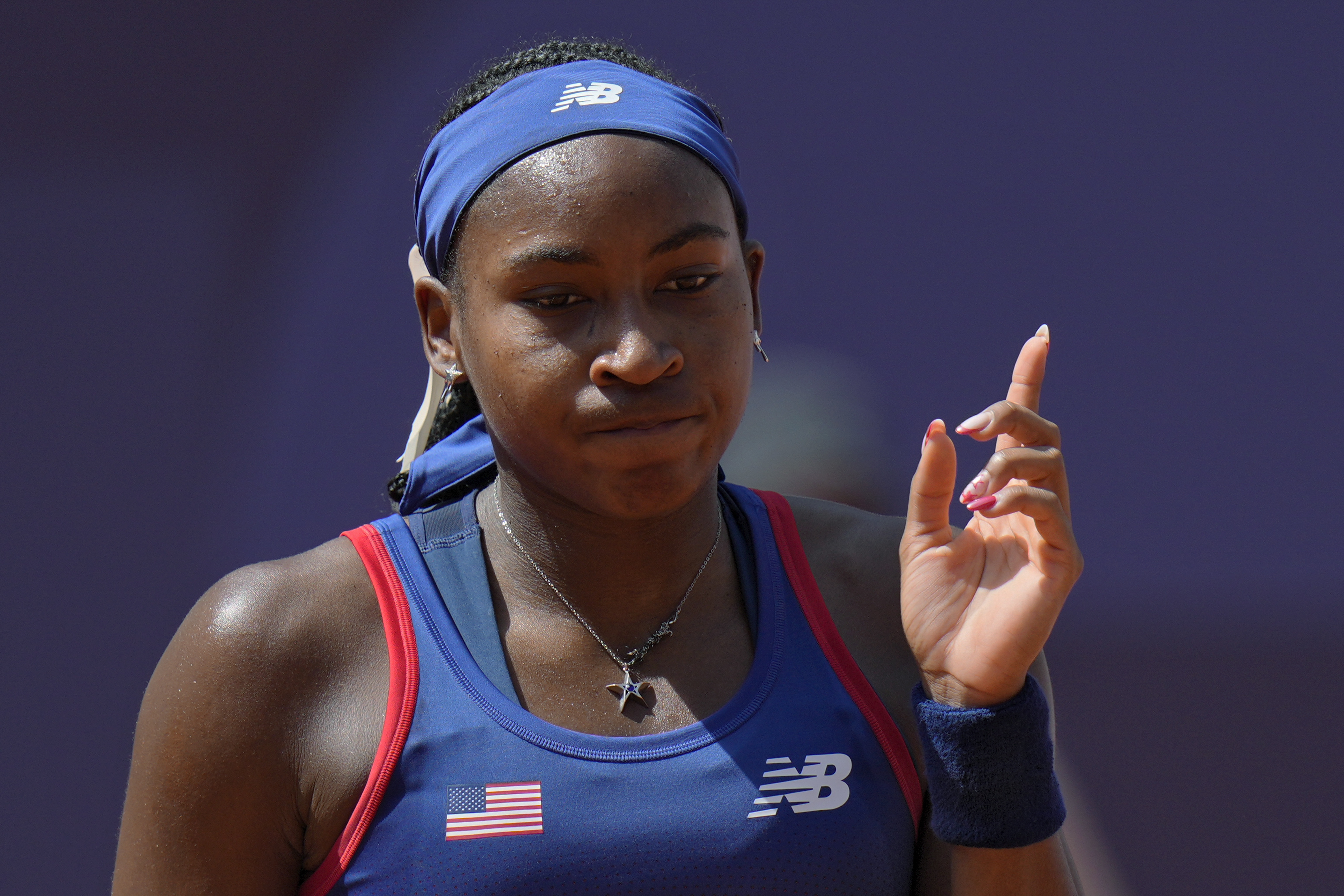 Coco Gauff of United States gestures as she plays against Donna Vekic of Croatiathe during their women's singles third round match at the Roland Garros stadium, at the 2024 Summer Olympics, Tuesday, July 30, 2024, in Paris, France. 