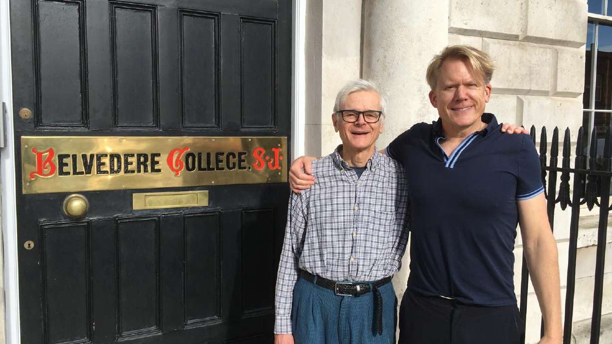 John Portmann with his partner Dan in front of Belvedere College, a Catholic school in Dublin where his biological grandfather taught Latin and Greek.
