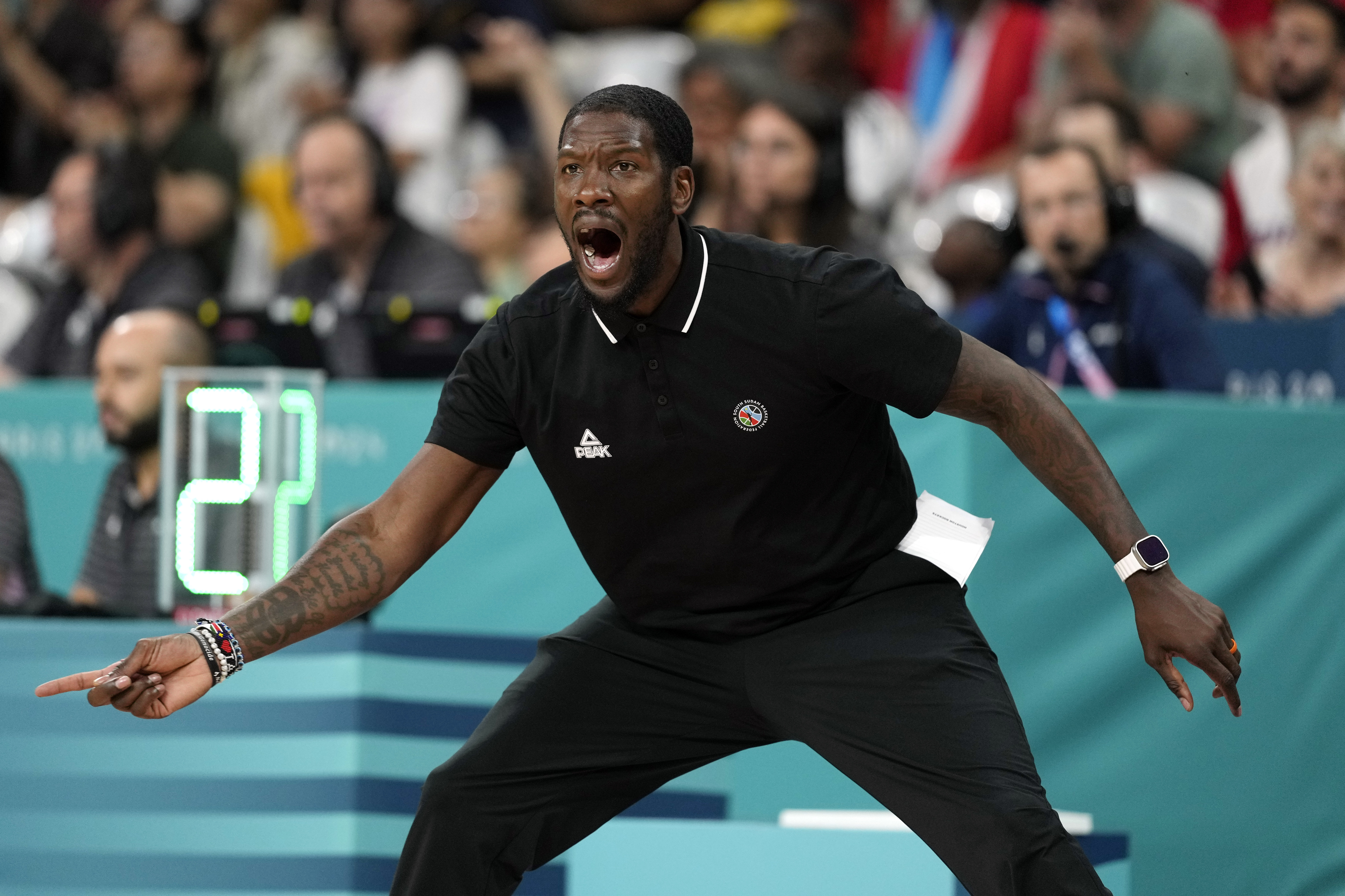 South Sudan head coach Royal Ivey gestures in a men's basketball game against Puerto Rico at the 2024 Summer Olympics, Sunday, July 28, 2024, in Villeneuve-d'Ascq, France. 
