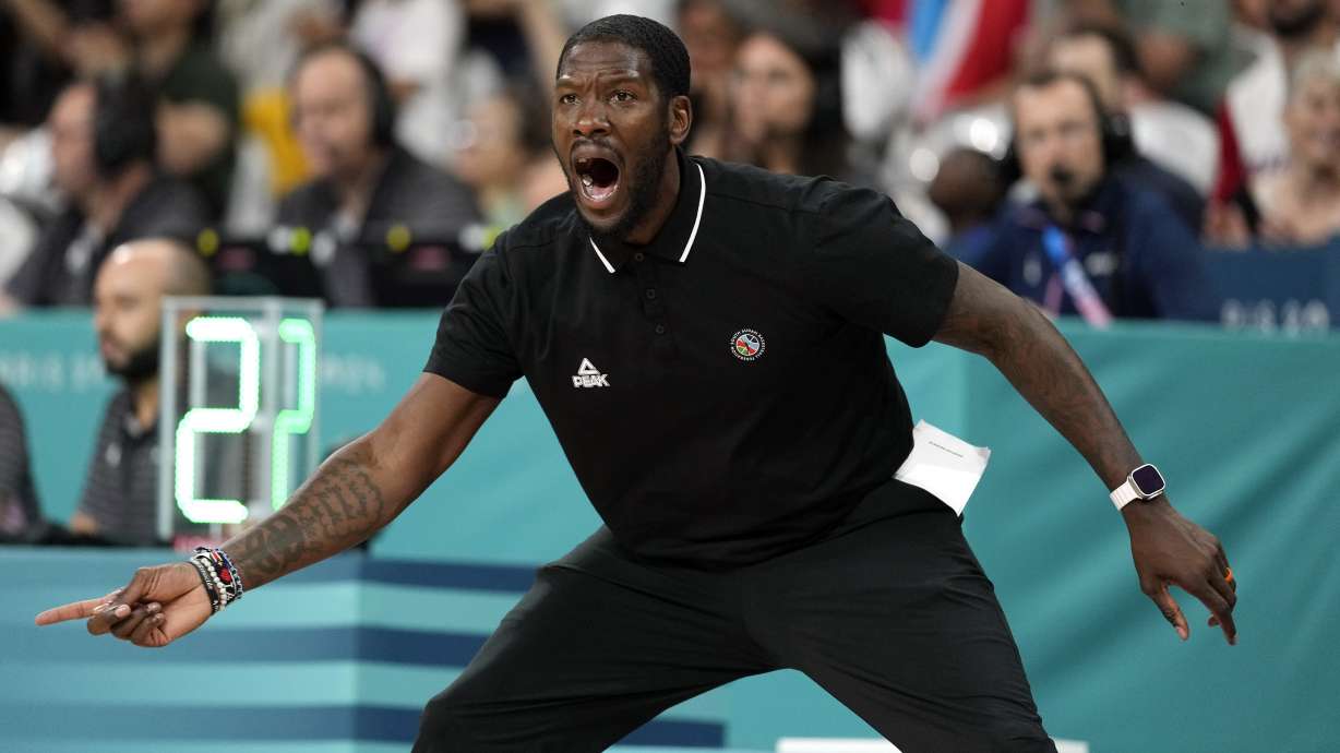 South Sudan head coach Royal Ivey gestures in a men's basketball game against Puerto Rico at the 2024 Summer Olympics, Sunday, July 28, 2024, in Villeneuve-d'Ascq, France.