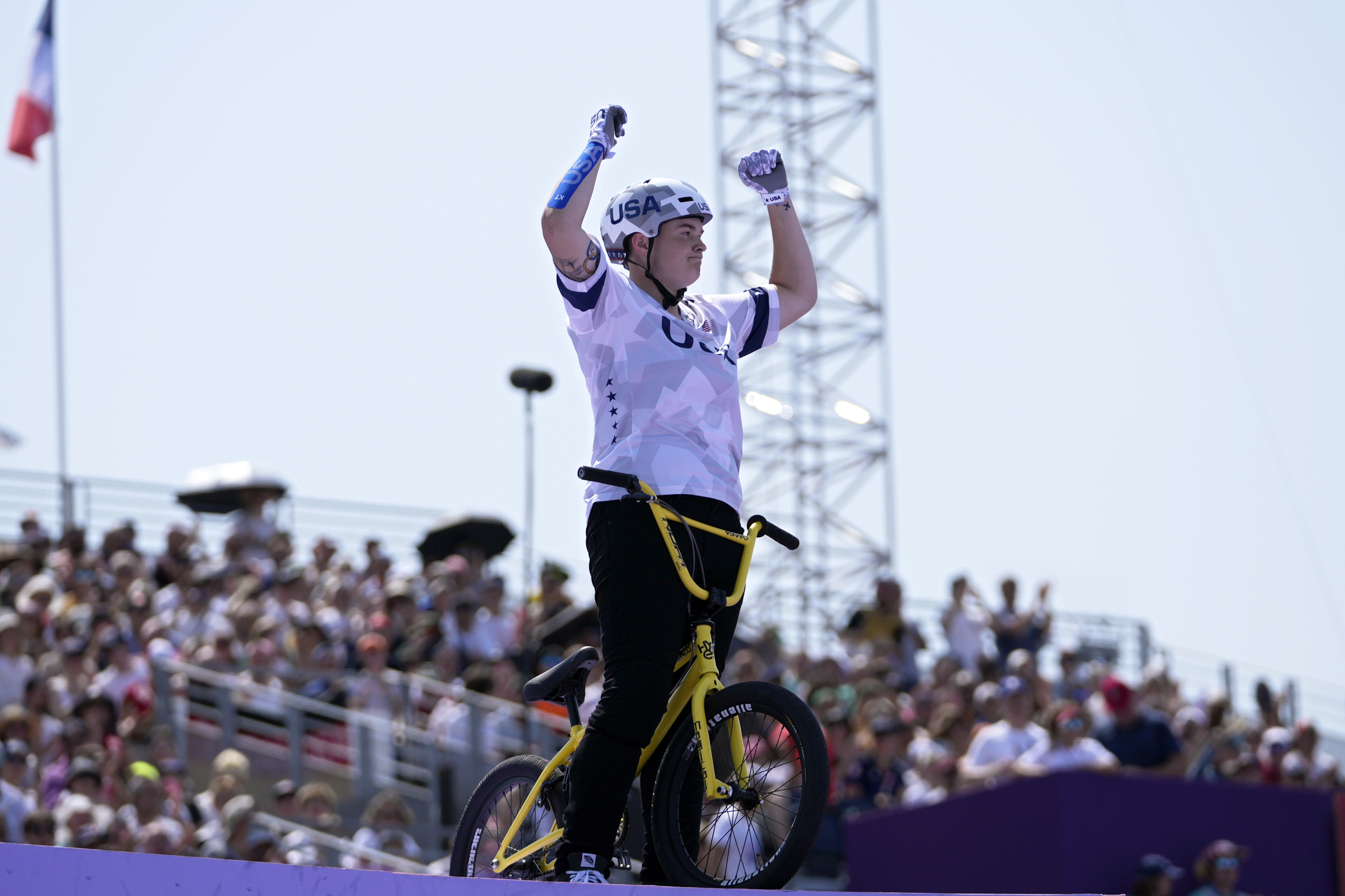 Hannah Roberts, of the United States, gestures to the fans during the cycling BMX freestyle women's park qualification at the 2024 Summer Olympics, Tuesday, July 30, 2024, in Paris, France. 