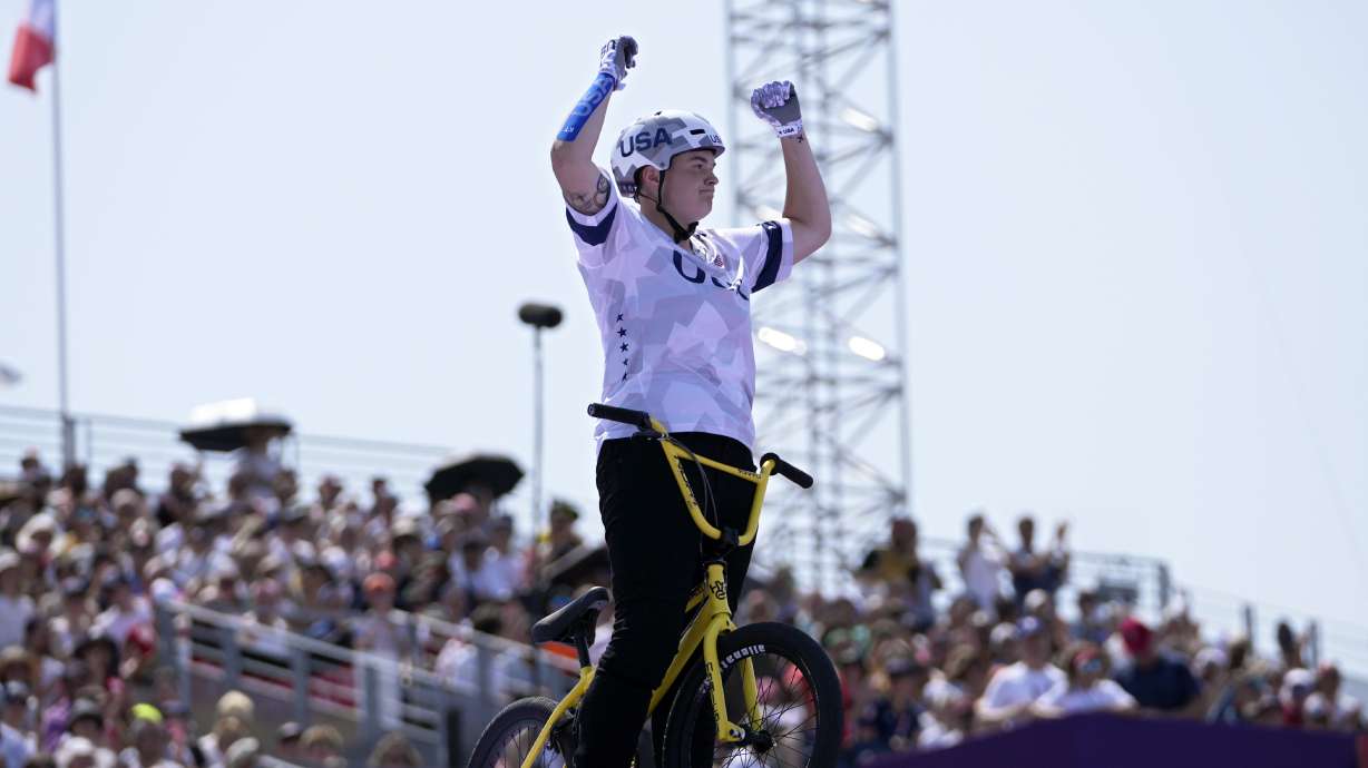 Hannah Roberts, of the United States, gestures to the fans during the cycling BMX freestyle women's park qualification at the 2024 Summer Olympics, Tuesday, July 30, 2024, in Paris, France.