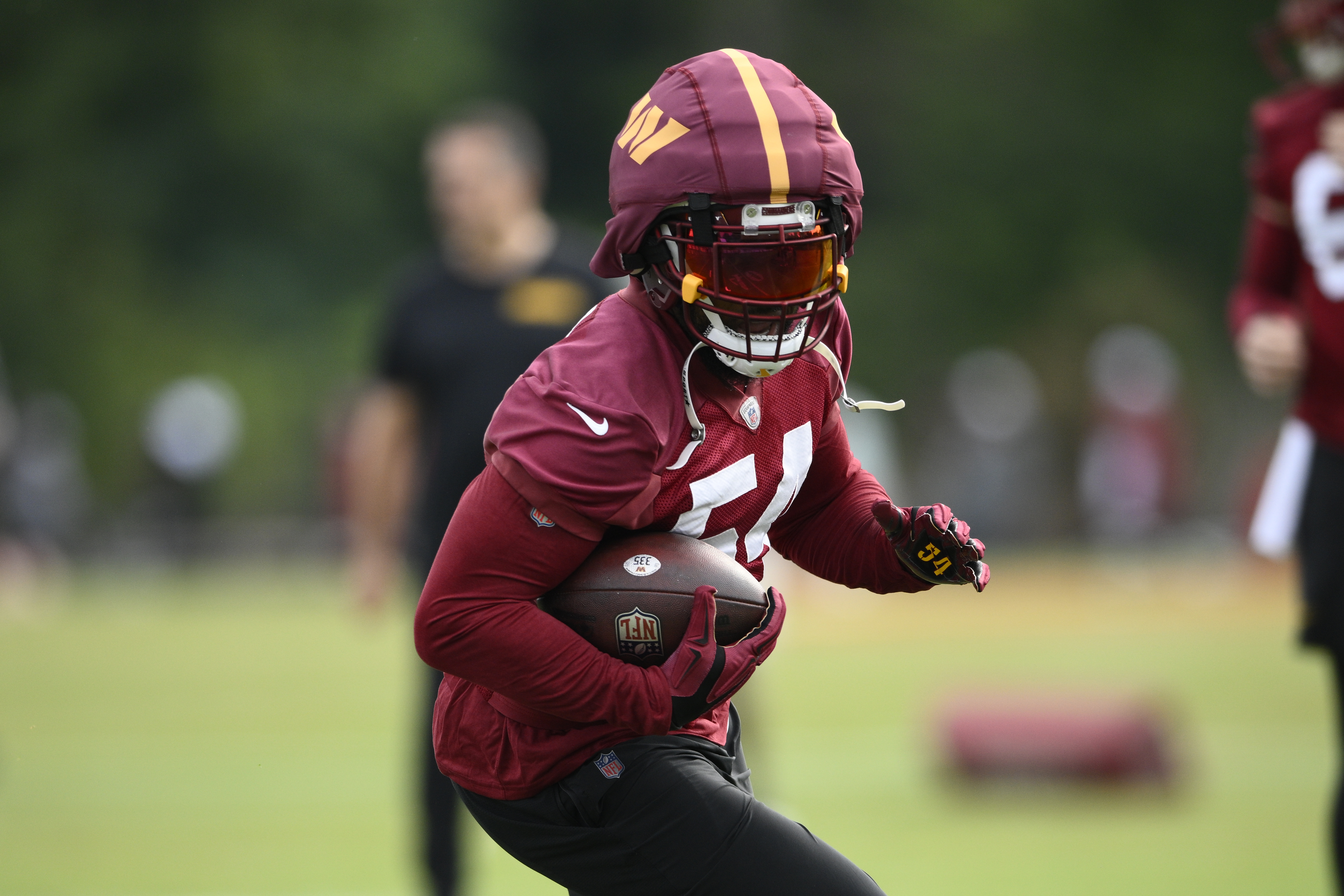 FILE _ Washington Commanders linebacker Bobby Wagner works out during NFL football training camp, Thursday, July 25, 2024, in Ashburn, Va.