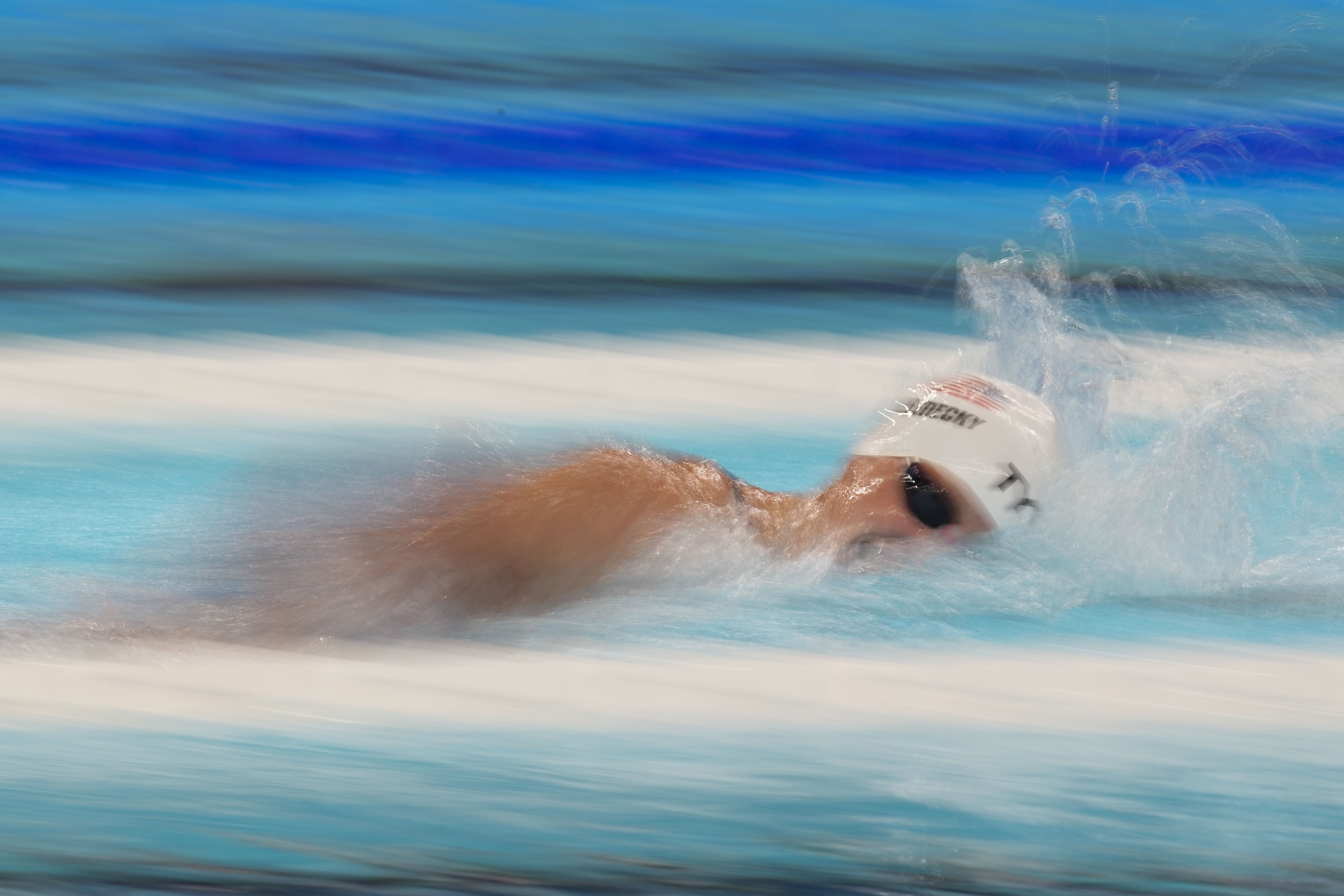 Katie Ledecky, of the United States, competes during a heat in the women's 1500-meter freestyle at the 2024 Summer Olympics, Tuesday, July 30, 2024, in Nanterre, France.