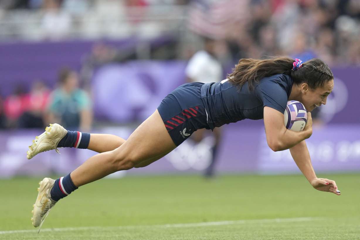 United States' Alex Sedrick, who prepped at Herriman High, scores the winning try during the women's bronze medal Rugby Sevens match between the United States and Australia at the 2024 Summer Olympics, in the Stade de France, in Saint-Denis, France, Tuesday, July 30, 2024. The US won the match 14-12.