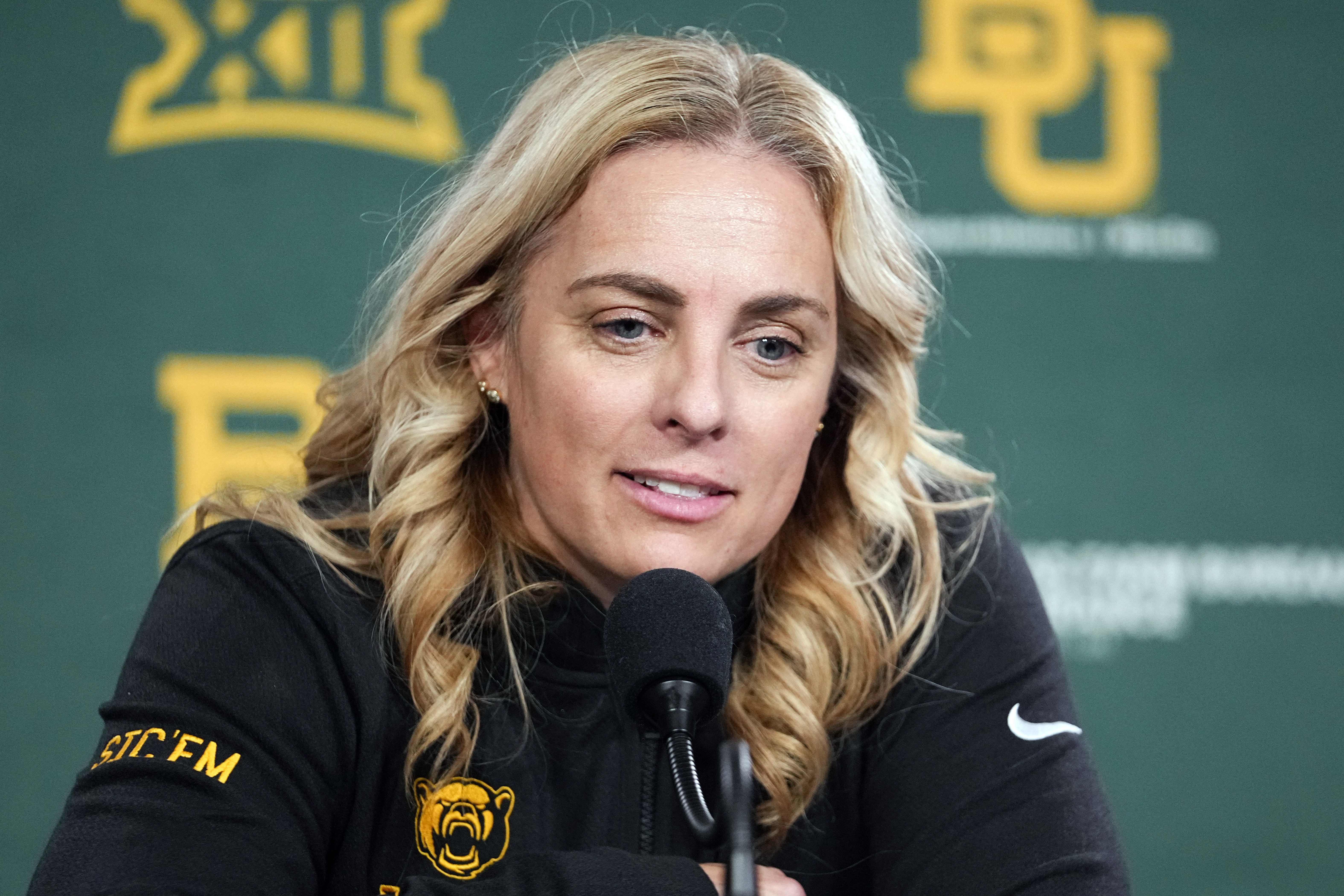 FILE - Baylor head coach Nicki Collen speaks to reporters following an NCAA college basketball game against Utah, Tuesday, Nov. 14, 2023, in Waco, Texas. Baylor has extended the contract of Collen through the 2029-30 season after a 74-28 record and NCAA Tournament appearances in each of her first three years with the Bears. 