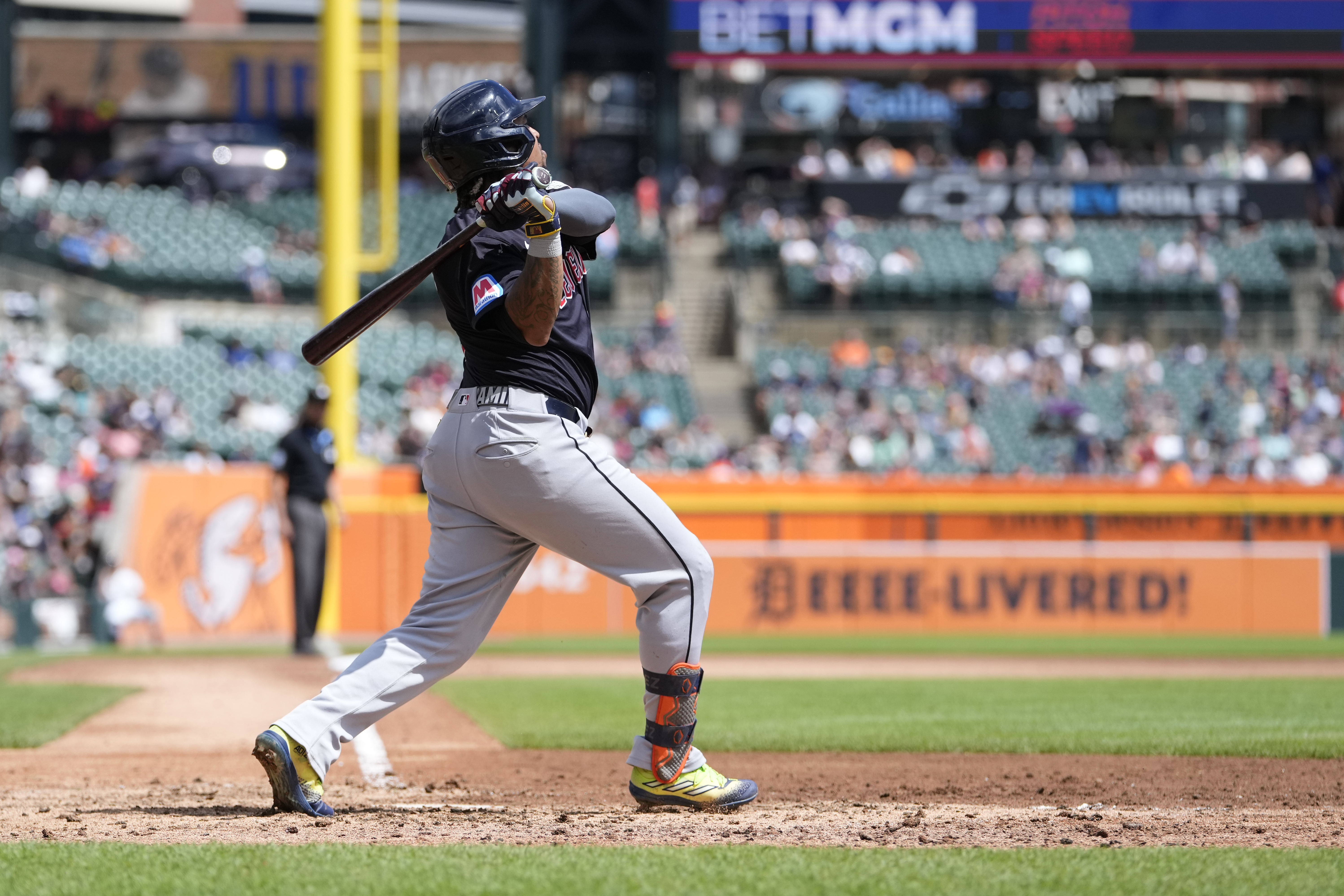 Cleveland Guardians designated hitter Jose Ramírez follows through on his two-run home run during the eighth inning of a baseball game against the Detroit Tigers, Tuesday, July 30, 2024, in Detroit. 