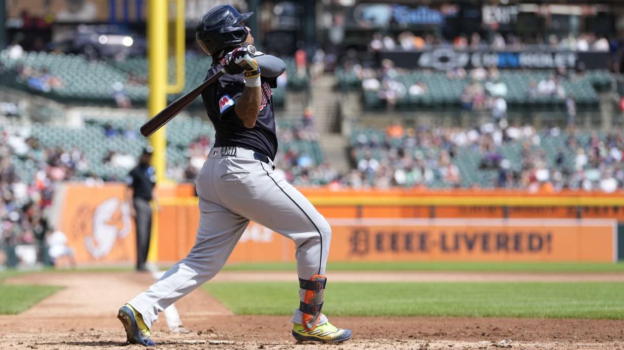 Cleveland Guardians designated hitter Jose Ramírez follows through on his two-run home run during the eighth inning of a baseball game against the Detroit Tigers, Tuesday, July 30, 2024, in Detroit.