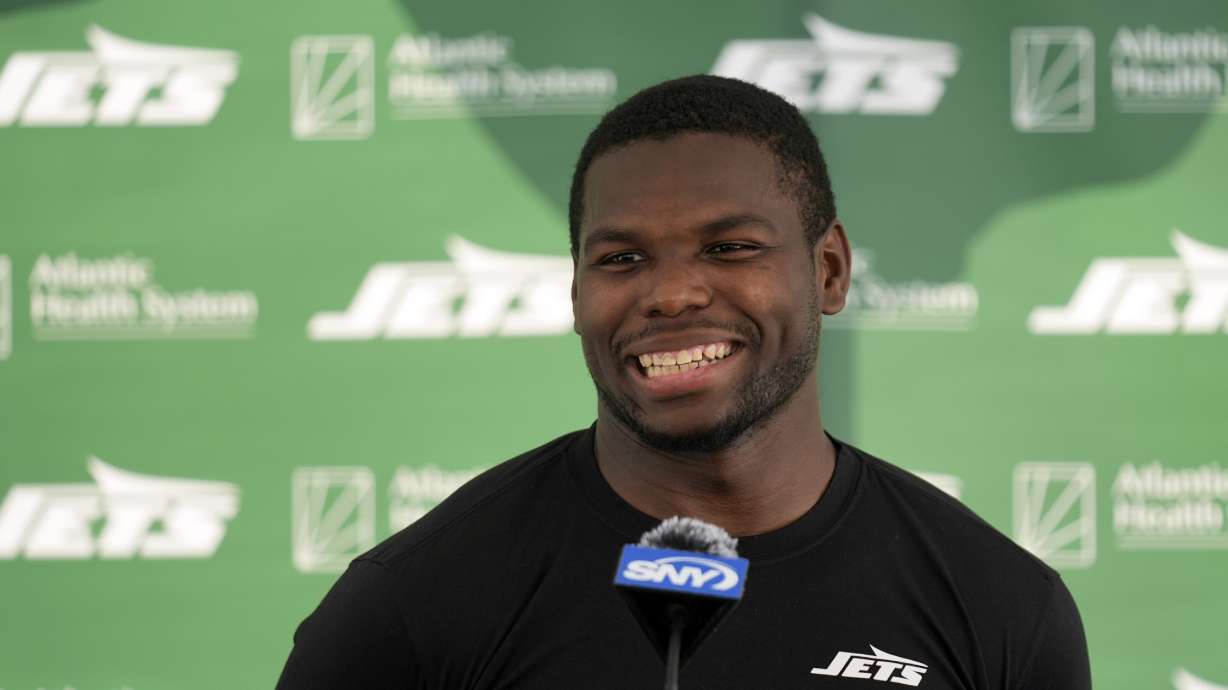 New York Jets' Tarik Cohen speaks to reporters after a practice at the NFL football team's training facility in Florham Park, N.J., Tuesday, July 30, 2024.